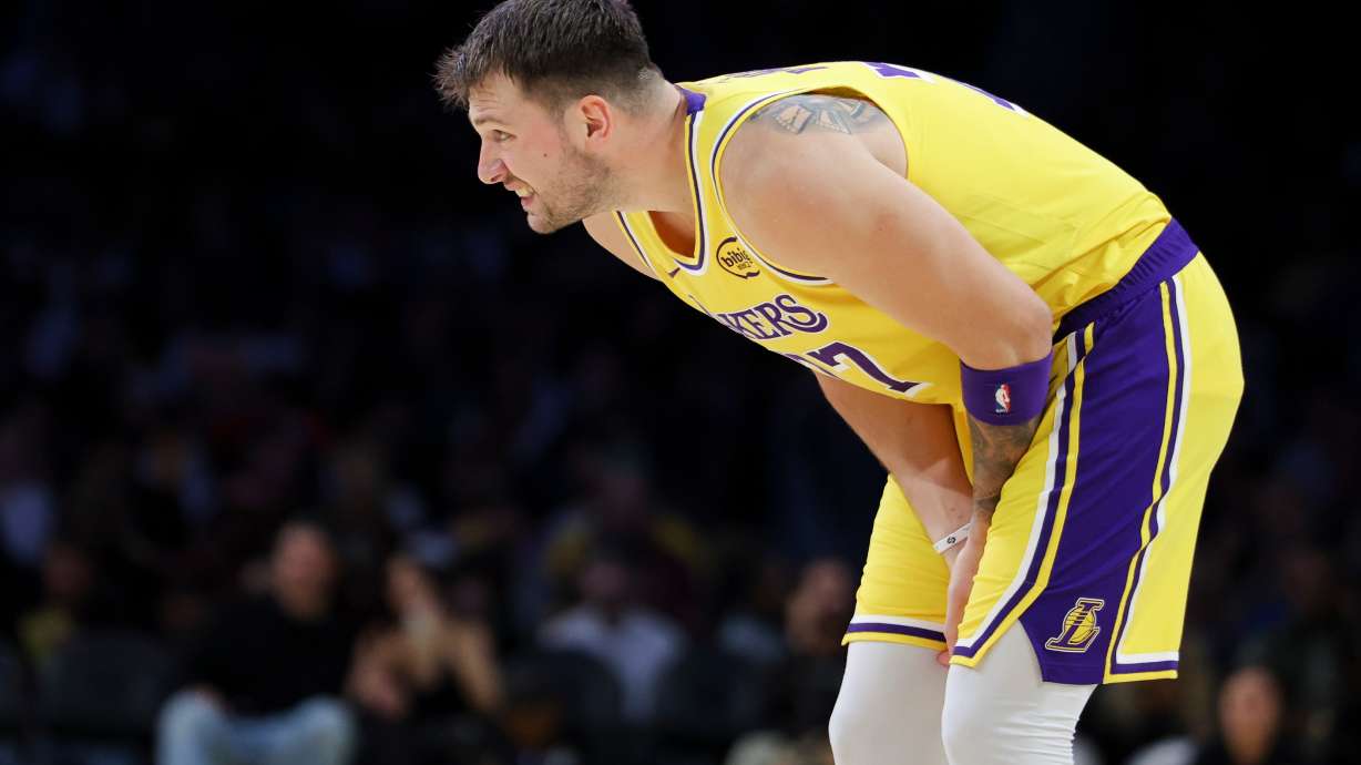 Los Angeles Lakers guard Luka Doncic reacts during the first half of an NBA basketball game against the Minnesota Timberwolves, Friday, Oct. 24, 2025, in Los Angeles.