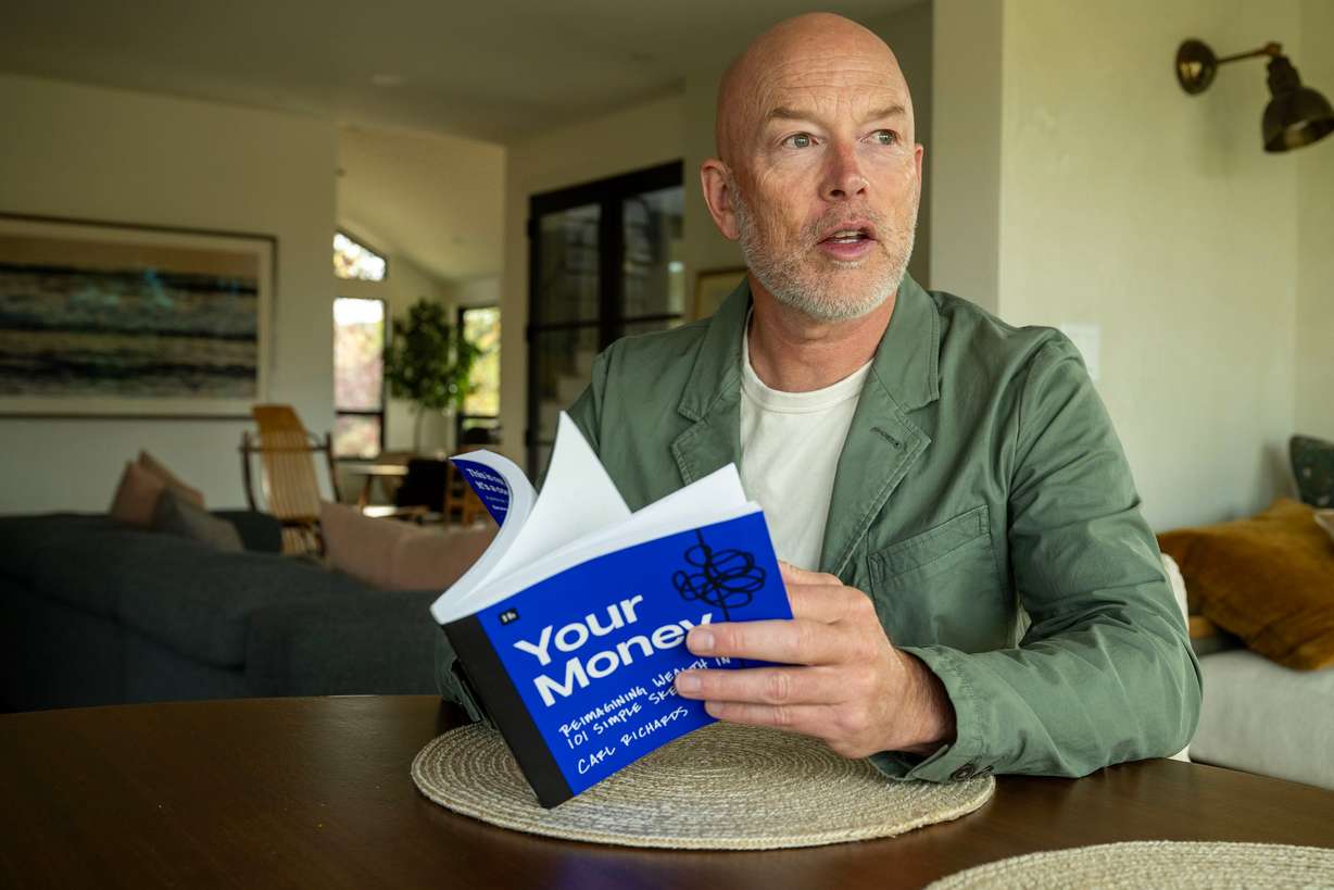 Carl Richards, author and financial adviser, poses for photos as he discusses his new book, "Your Money," at his Park City home on Oct. 13.