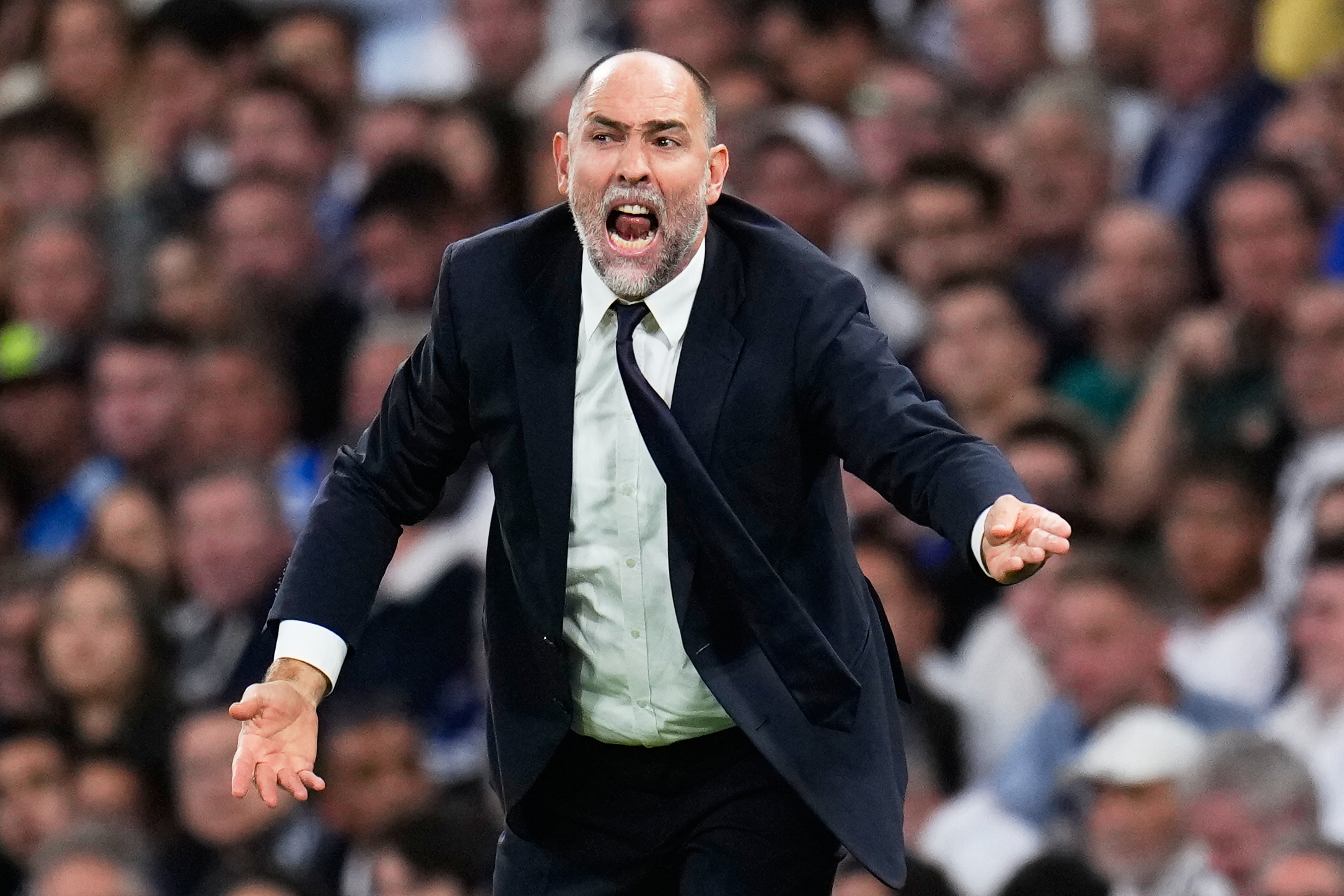 Juventus' head coach Igor Tudor shouts during the Champions League opening phase soccer match between Real Madrid and Juventus in Madrid, Spain, Wednesday, Oct. 22, 2025.