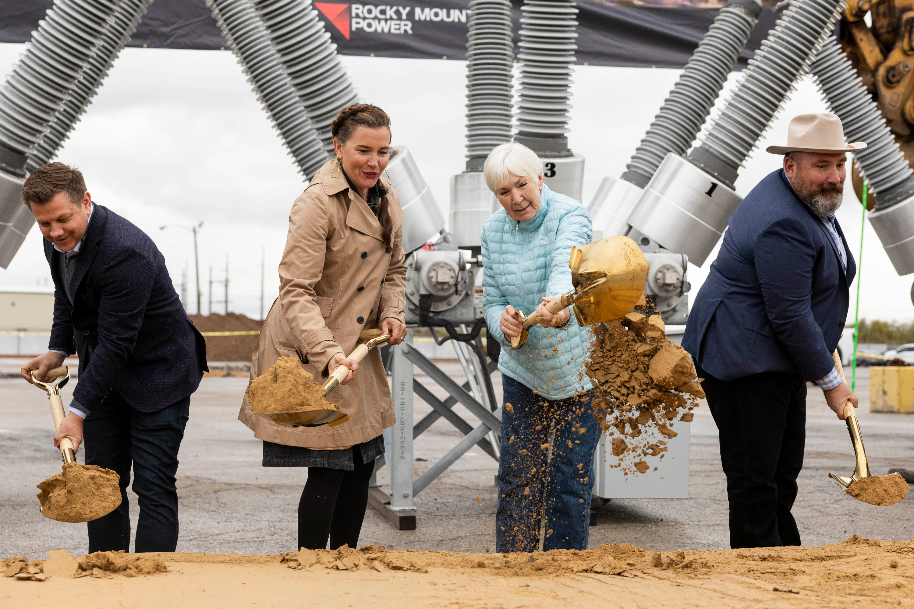 From left, Steve Starks, CEO of the Larry H. Miller Company, Salt Lake City Mayor Erin Mendenhall, Gail Miller and Dick Garlish, president of Rocky Mountain Power, take part in the groundbreaking ceremony for the Power District in Salt Lake City on Monday.