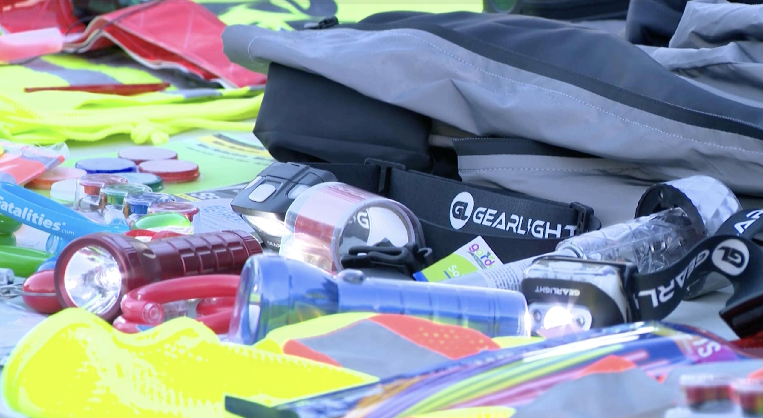 Reflective gear and flashlights recommended for trick-or-treaters by the Utah Department of Public Safety are on display at a Halloween safety media event on Tuesday.