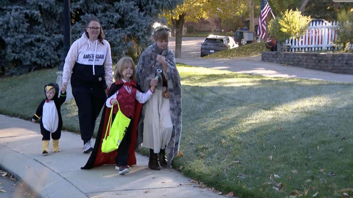 Trick-or-treaters model what good reflective gear looks like during a Halloween safety event put on by the Utah Department of Public Safety on Tuesday. State officials provided safety tips for trick-or-treaters and drivers alike at the event.