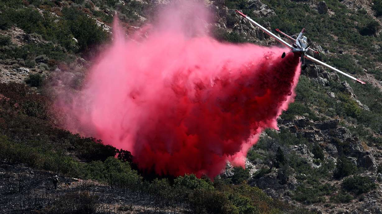 Firefighters battle Willard Peak wildfire above North Ogden on Aug. 14. Utah land managers released a new map on Thursday, outlining nearly 60,000 "high risk" wildland-urban interface structures across the state.