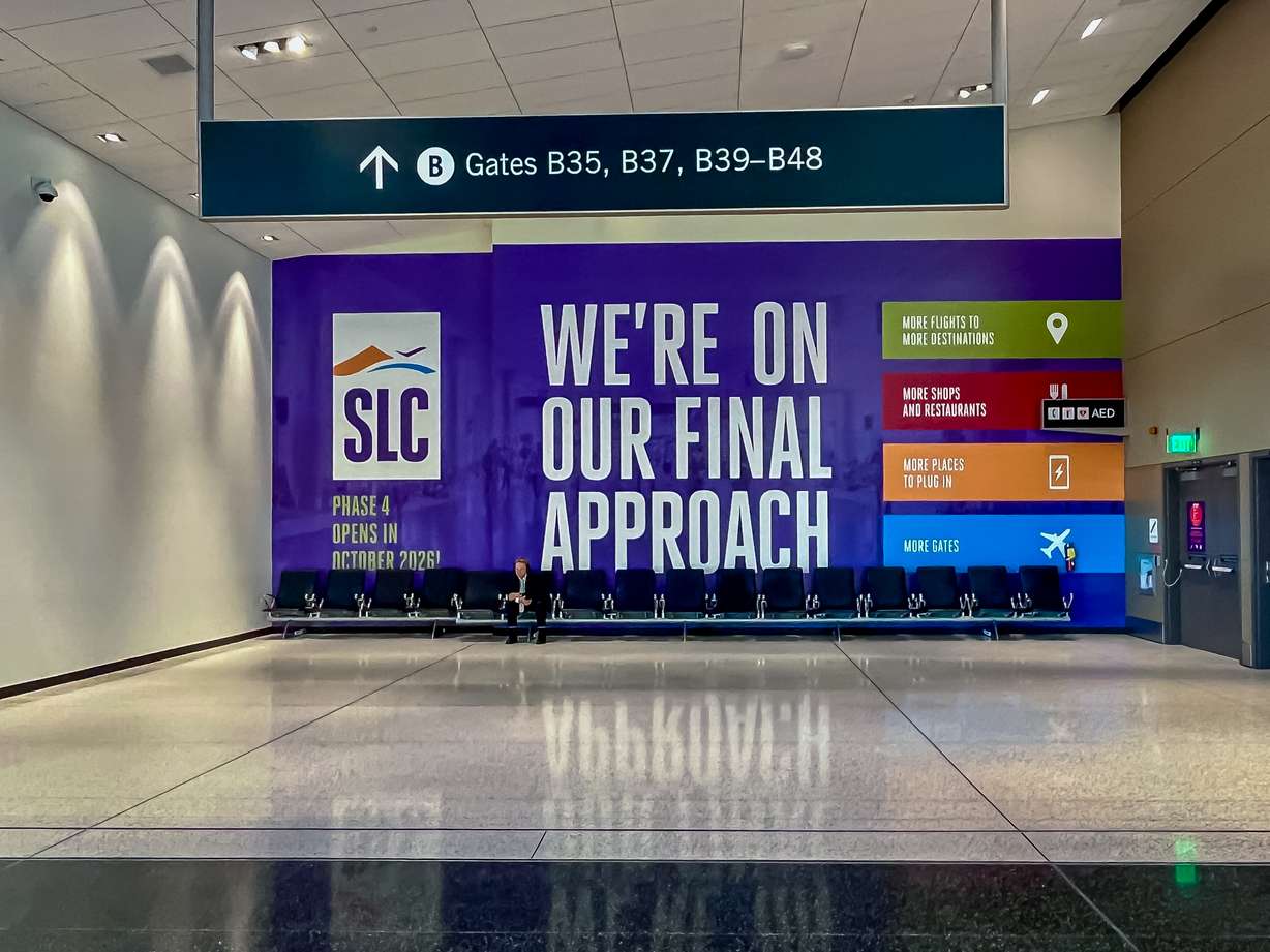 A sign covering the last phase of Concourse B construction at Salt Lake City International Airport on Tuesday. The final 11 gates are slated to open in 2026.