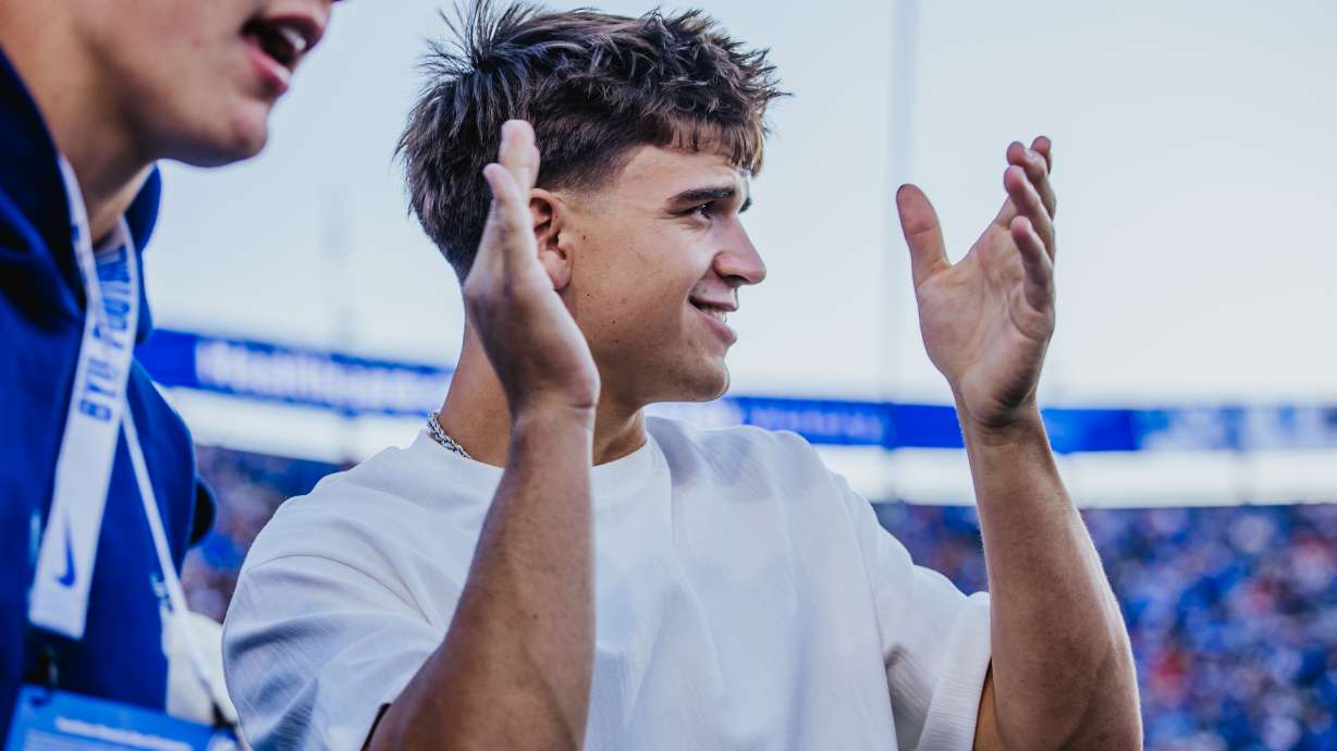BYU quarterback commit Ryder Lyons cheers during the Cougars' rivalry game against Utah, Saturday, Oct. 18, 2025 at LaVell Edwards Stadium in Provo, Utah.