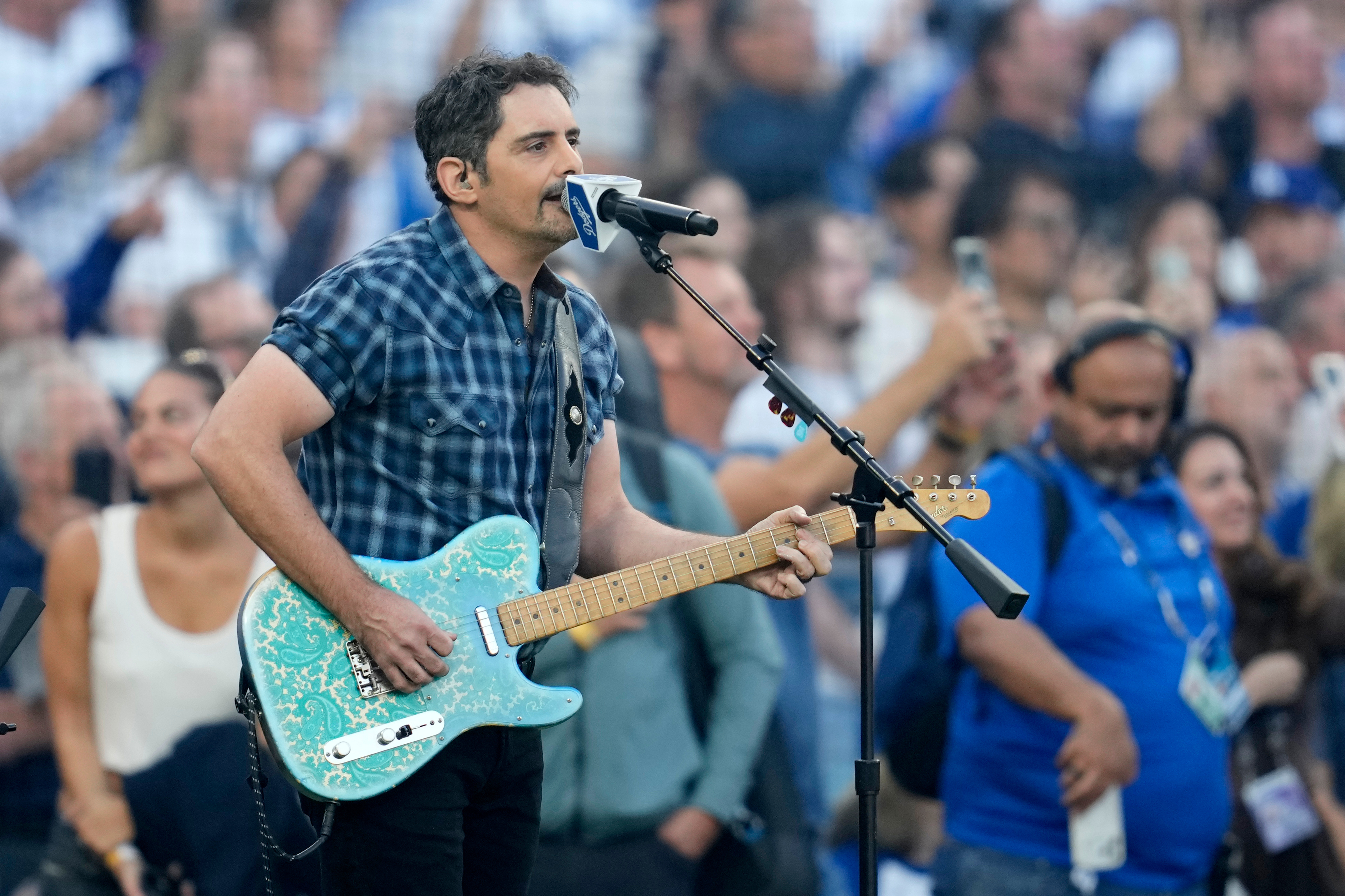 Recording artist Brad Paisley perform the national anthem prior to Game 3 of baseball's World Series between the Toronto Blue Jays and the Los Angeles Dodgers, Monday, Oct. 27, 2025, in Los Angeles.