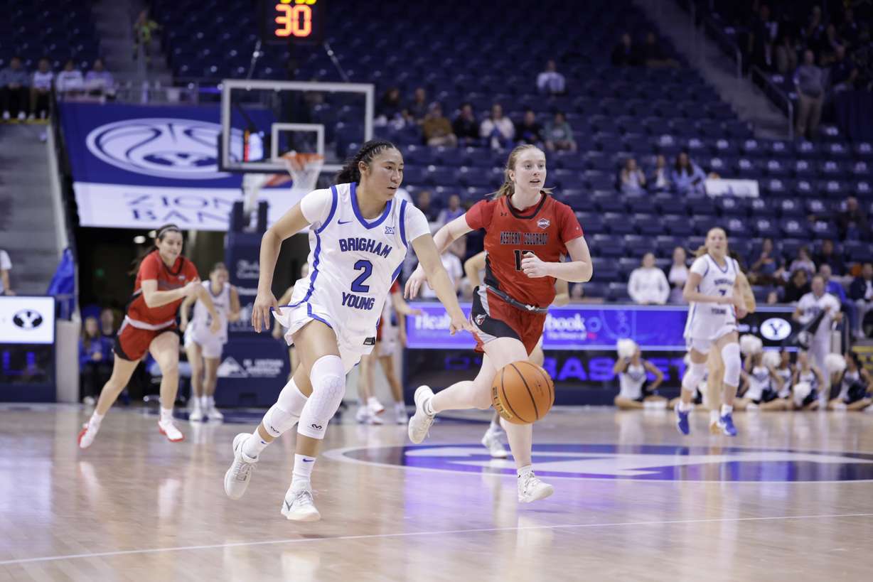 BYU's Sydney Benally dribbles in transition during an exhibition game against Western Colorado, Tuesday, oct. 28, 2025 in the Marriott Center in Provo, Utah.