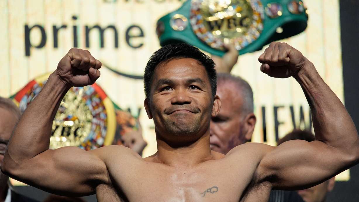 FILE - Manny Pacquiao poses on the scale during a ceremonial weigh in Friday, July 18, 2025, in Las Vegas.