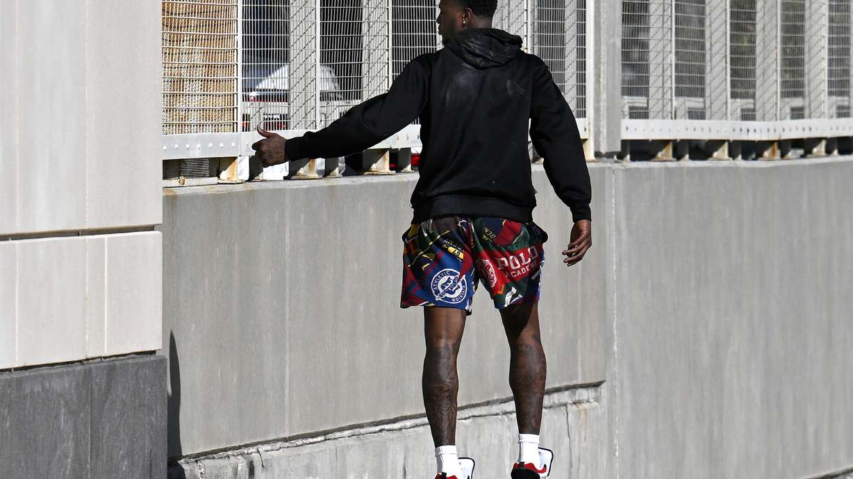 Miami Heat guard Terry Rozier leaves the U.S. Federal Courthouse through a side door after his arraignment, Thursday, Oct. 23, 2025, in Orlando, Fla.