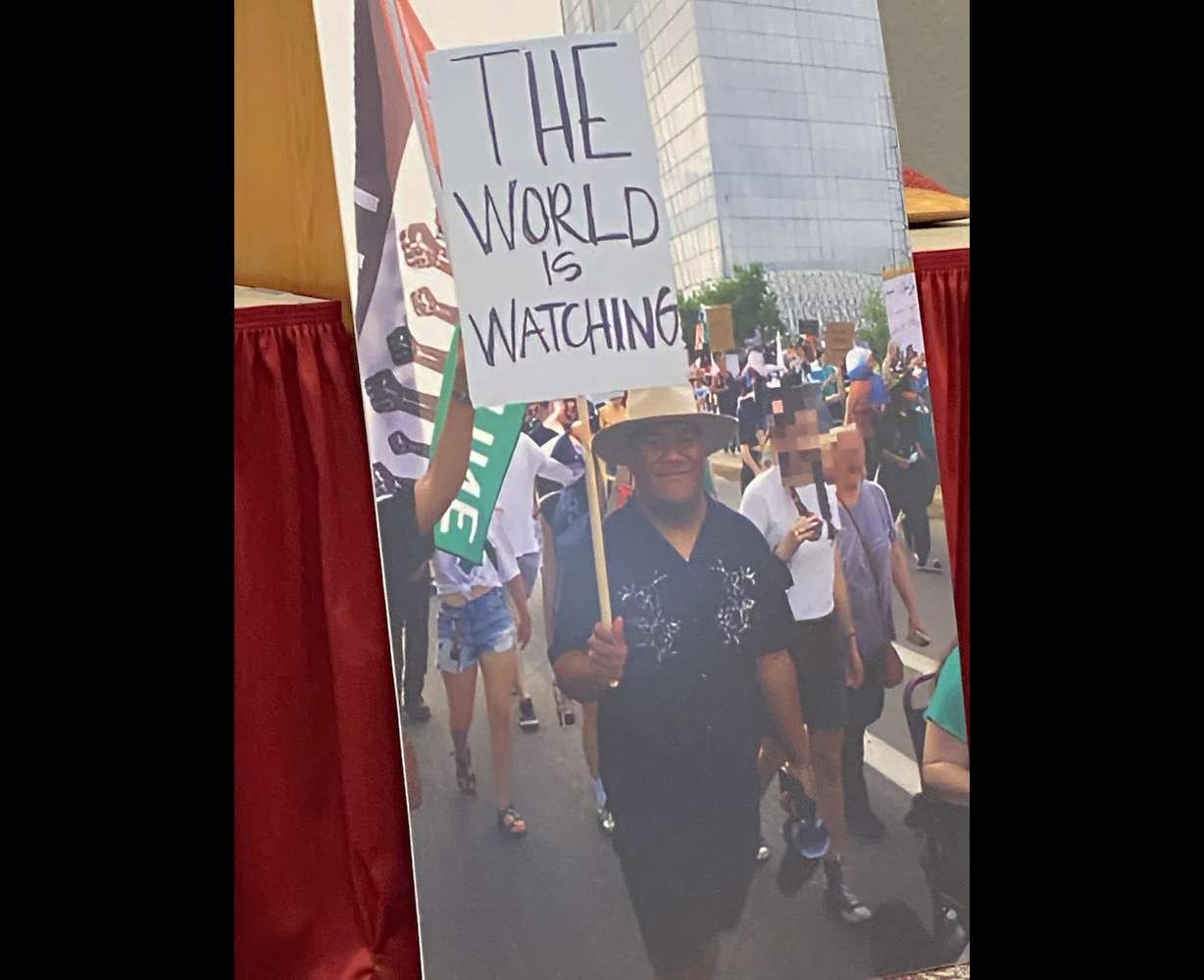 A photo of Arthur Folasa "Afa" Ah Loo protesting in Salt Lake City on June 14, 2025, is displayed during a press conference Oct. 29, 2025, in Salt Lake City. Ah Loo was shot and killed during the protest.