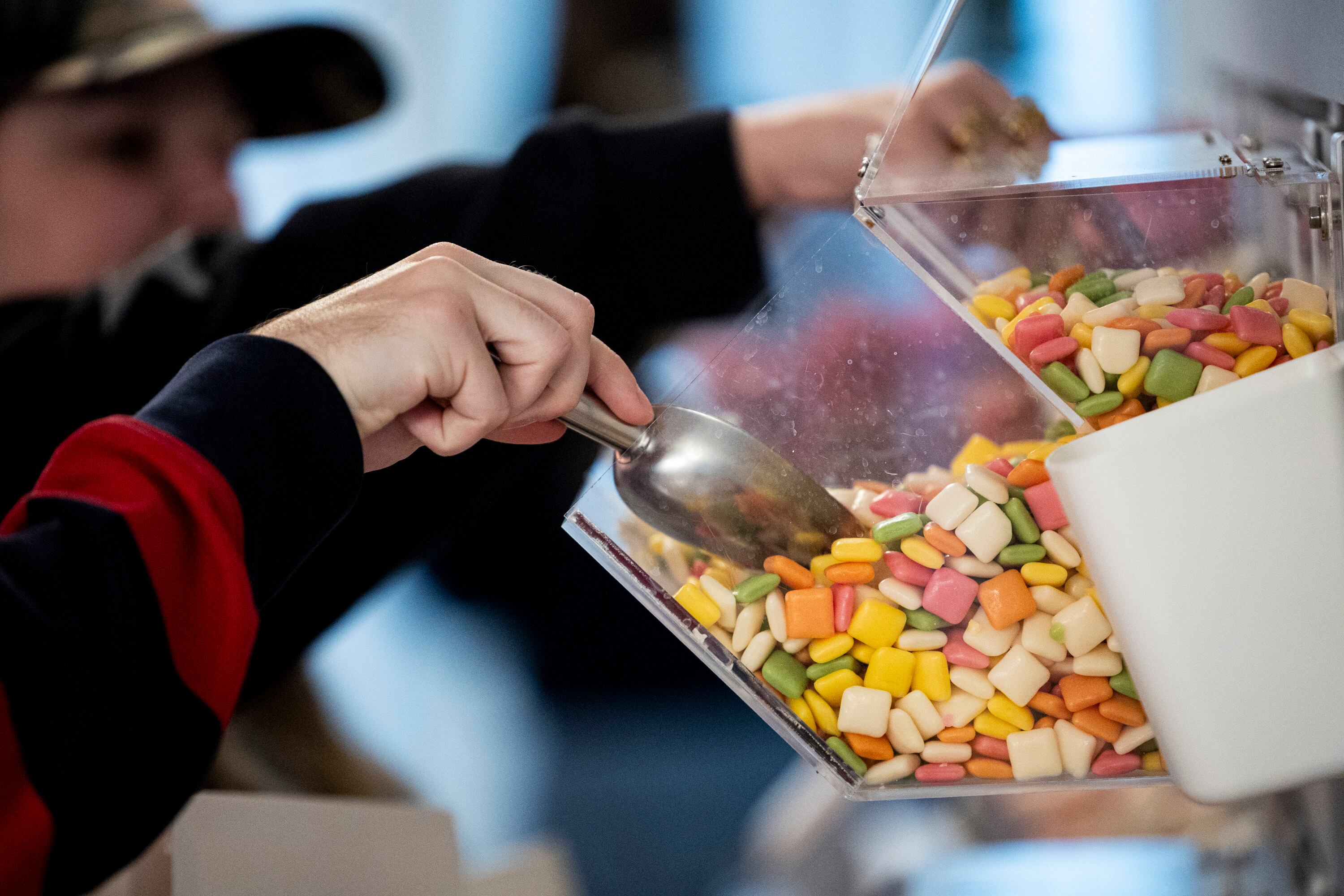 Customers pick out candy at So Swede! in American Fork on Oct. 22. Owner Olivia Redd said seeing people from all walks of life coming to the store is the best part of the job.