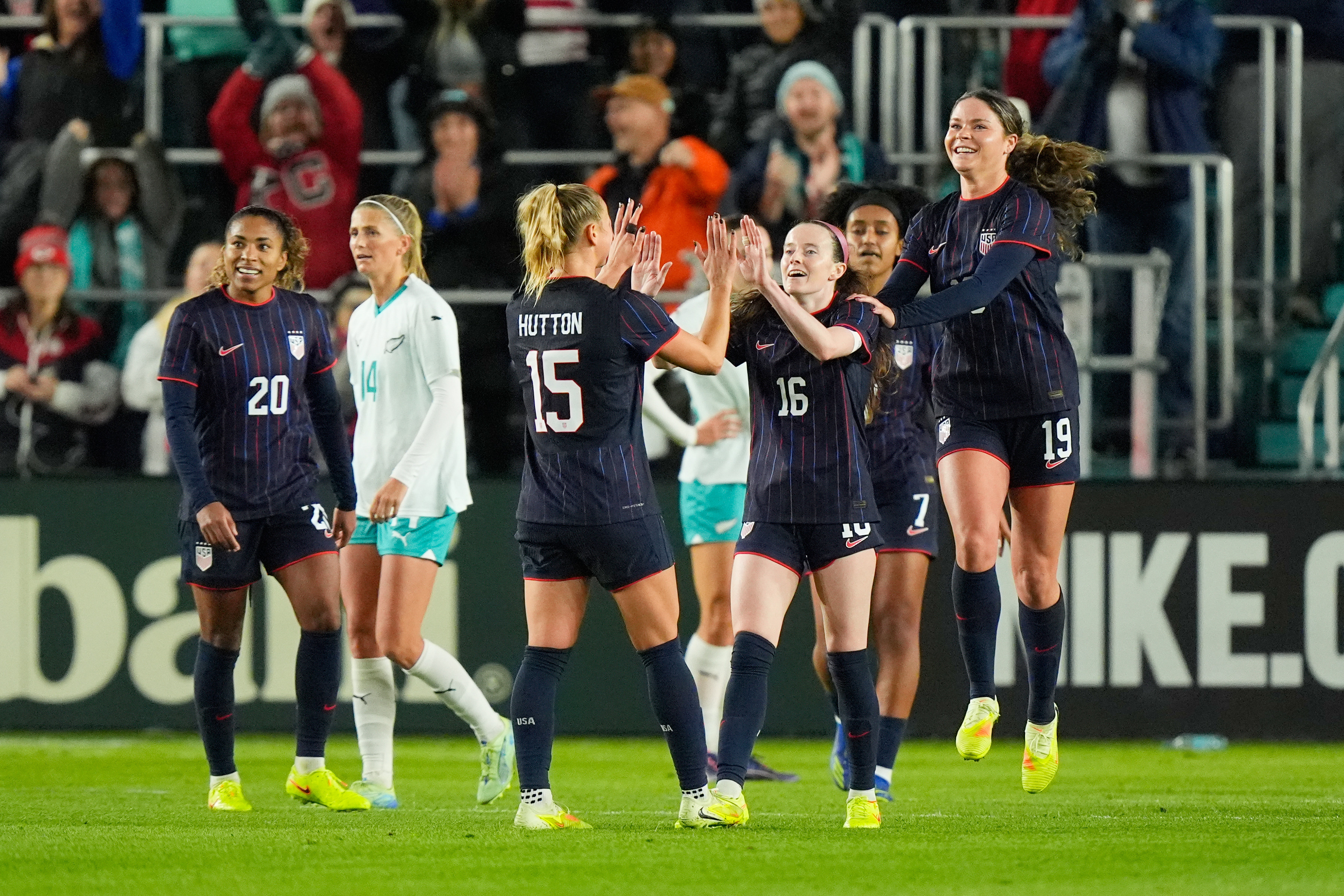 United States midfielder Rose Lavelle (16) celebrates with teammates after scoring a goal during the first half of a women's international friendly soccer match against New Zealand, Wednesday, Oct. 29, 2025, in Kansas City, Mo. 