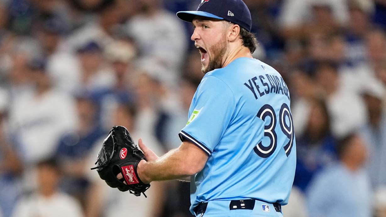 Toronto Blue Jays pitcher Trey Yesavage celebrates the end on the seventh inning in Game 5 of baseball's World Series against the Los Angeles Dodgers, Wednesday, Oct. 29, 2025, in Los Angeles.