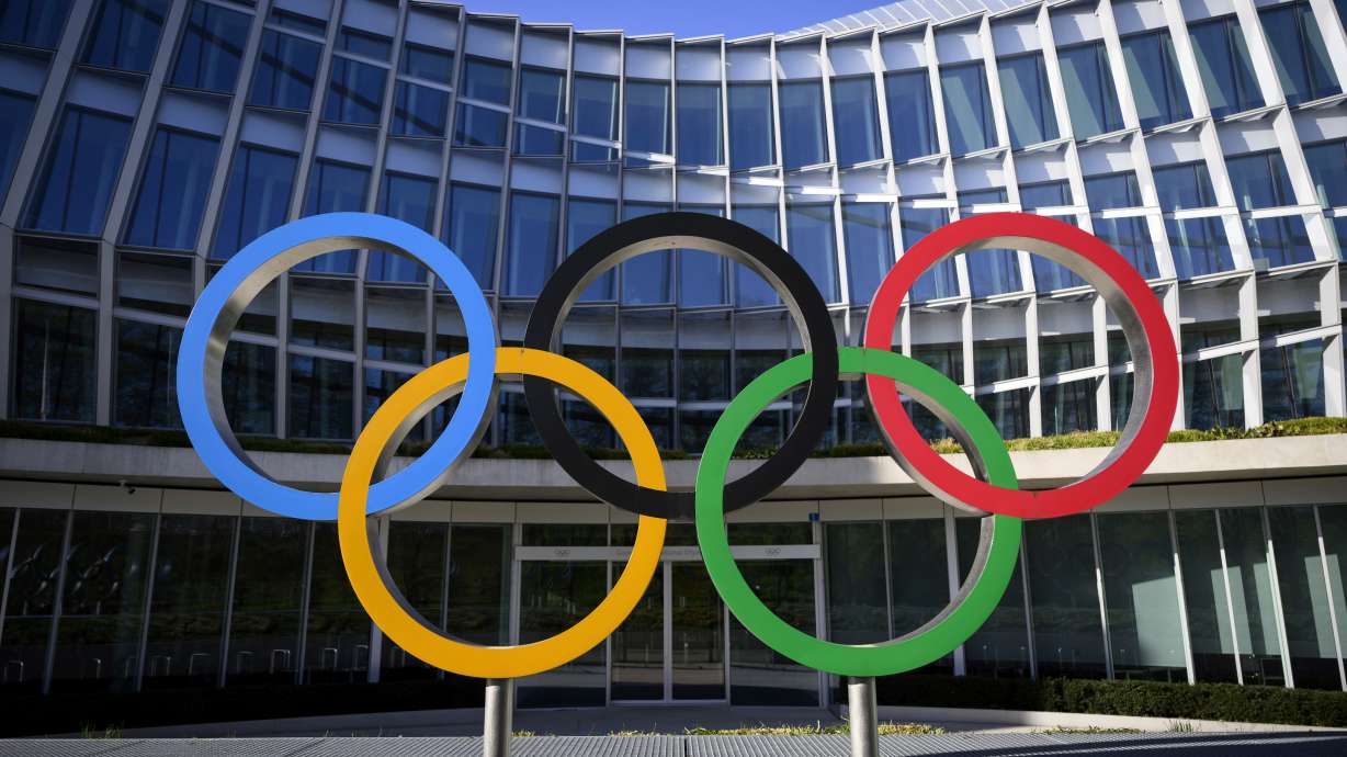 FILE -Olympic Rings are pictured in front of The Olympic House, headquarters of the International Olympic Committee (IOC) at the opening of the executive board meeting of the International Olympic Committee (IOC) in Lausanne, Switzerland, March 28, 2023.