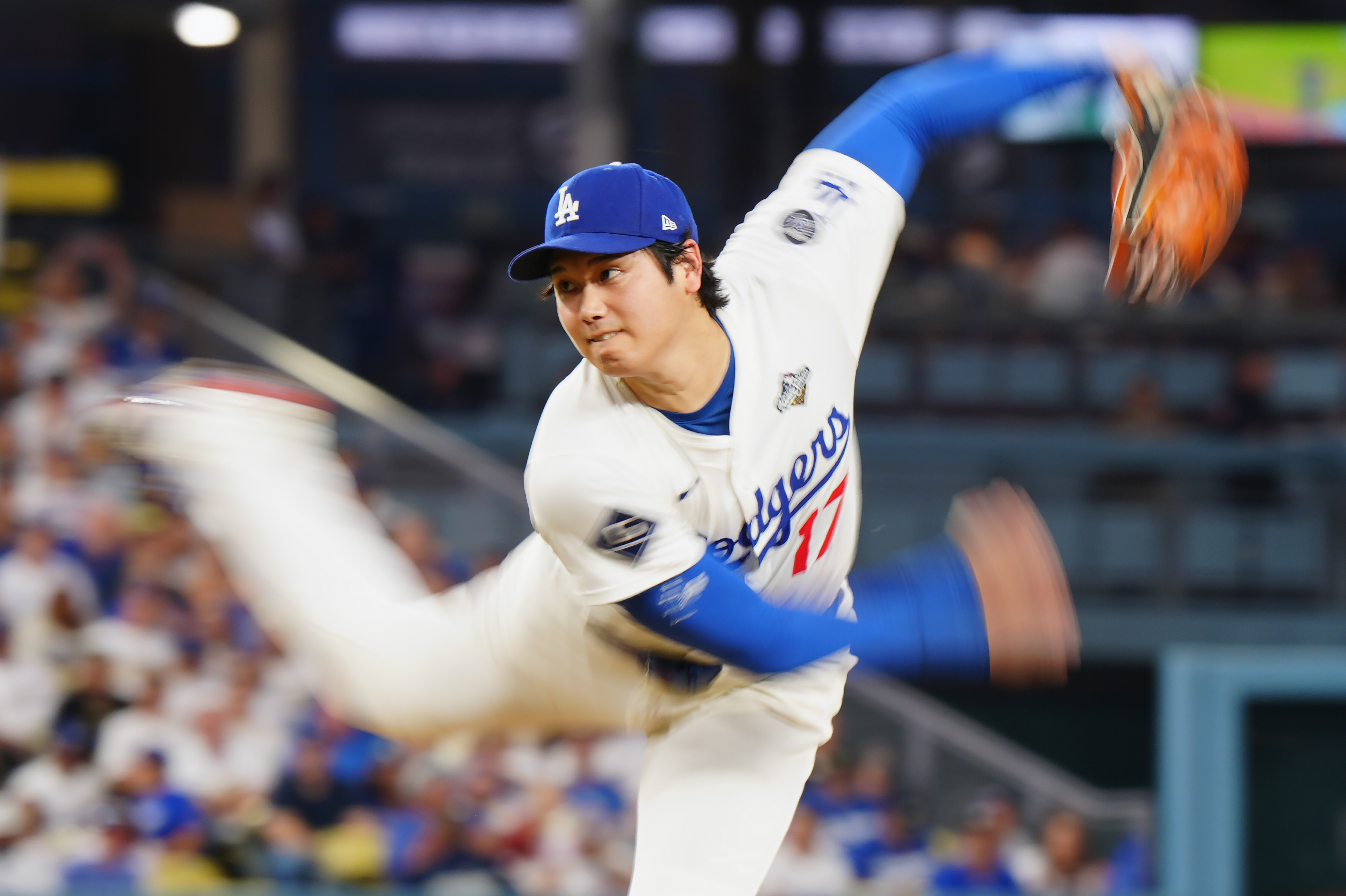 Los Angeles Dodgers pitcher Shohei Ohtani (17) delivers a pitch against the Toronto Blue Jays during fourth inning Game 4 World Series playoff MLB baseball action in Los Angeles on Tuesday, Oct. 28, 2025. 