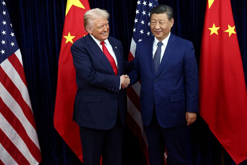 President Donald Trump and Chinese President Xi Jinping at Gimhae International Airport in Busan, South Korea, Thursday. Trump called his meeting with Xi "amazing."