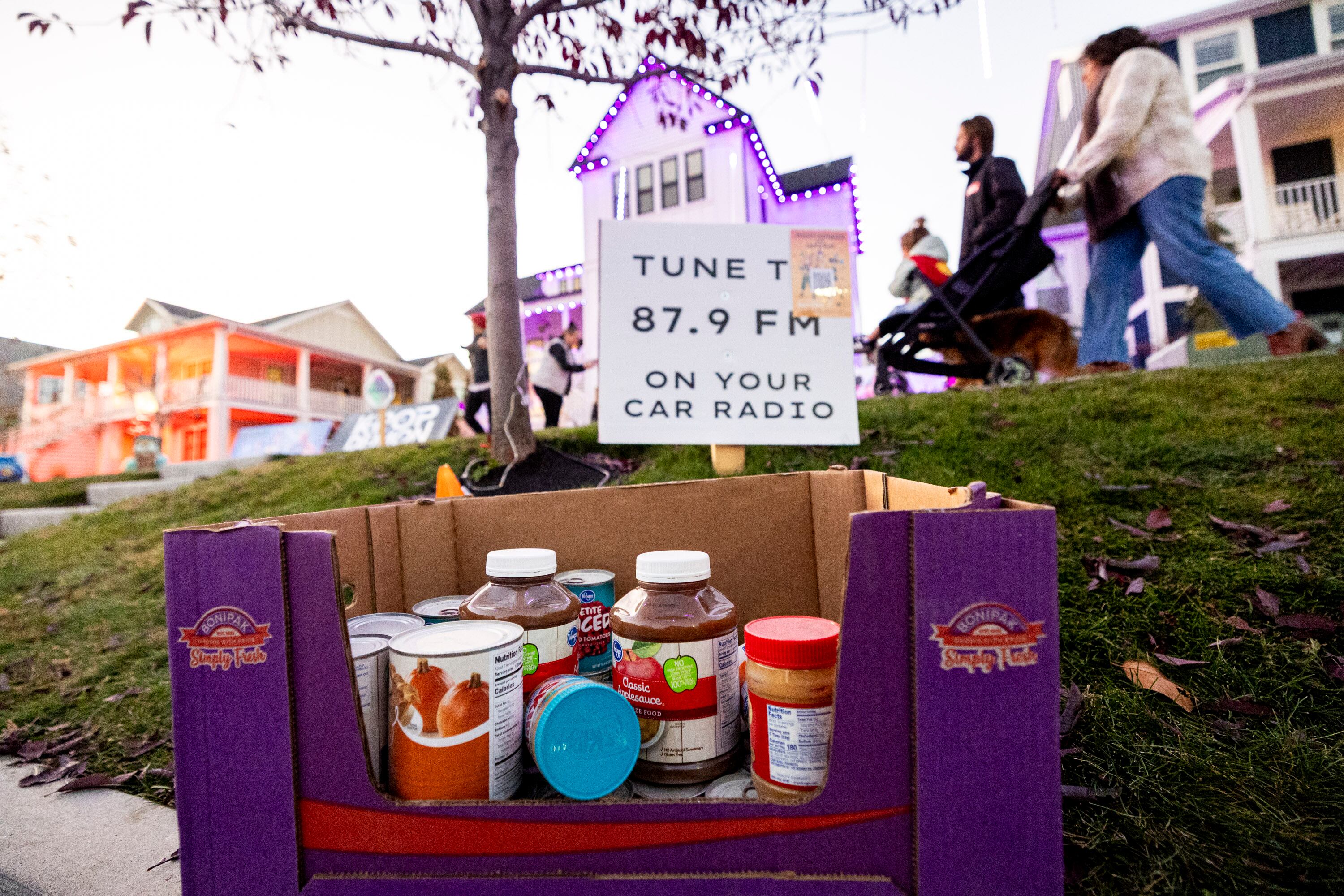Donated food outside Chelsey Vreeken's house in South Jordan, on Tuesday. Vreeken is taking advantage of the viral attention her house's Halloween decorations are getting.