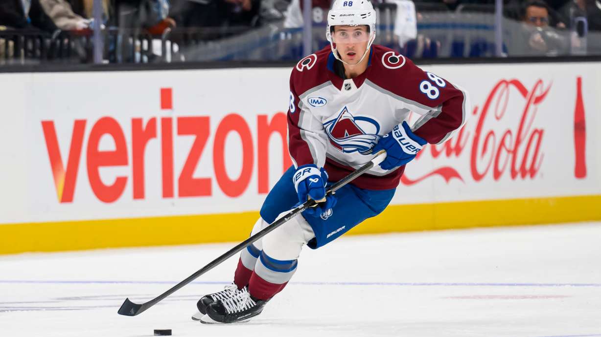 Colorado Avalanche center Martin Necas (88) skates the puck to the net leading to a goal during the third period of an NHL hockey game against the Utah Mammoth, Tuesday, Oct. 21, 2025, in Salt Lake City, Utah.