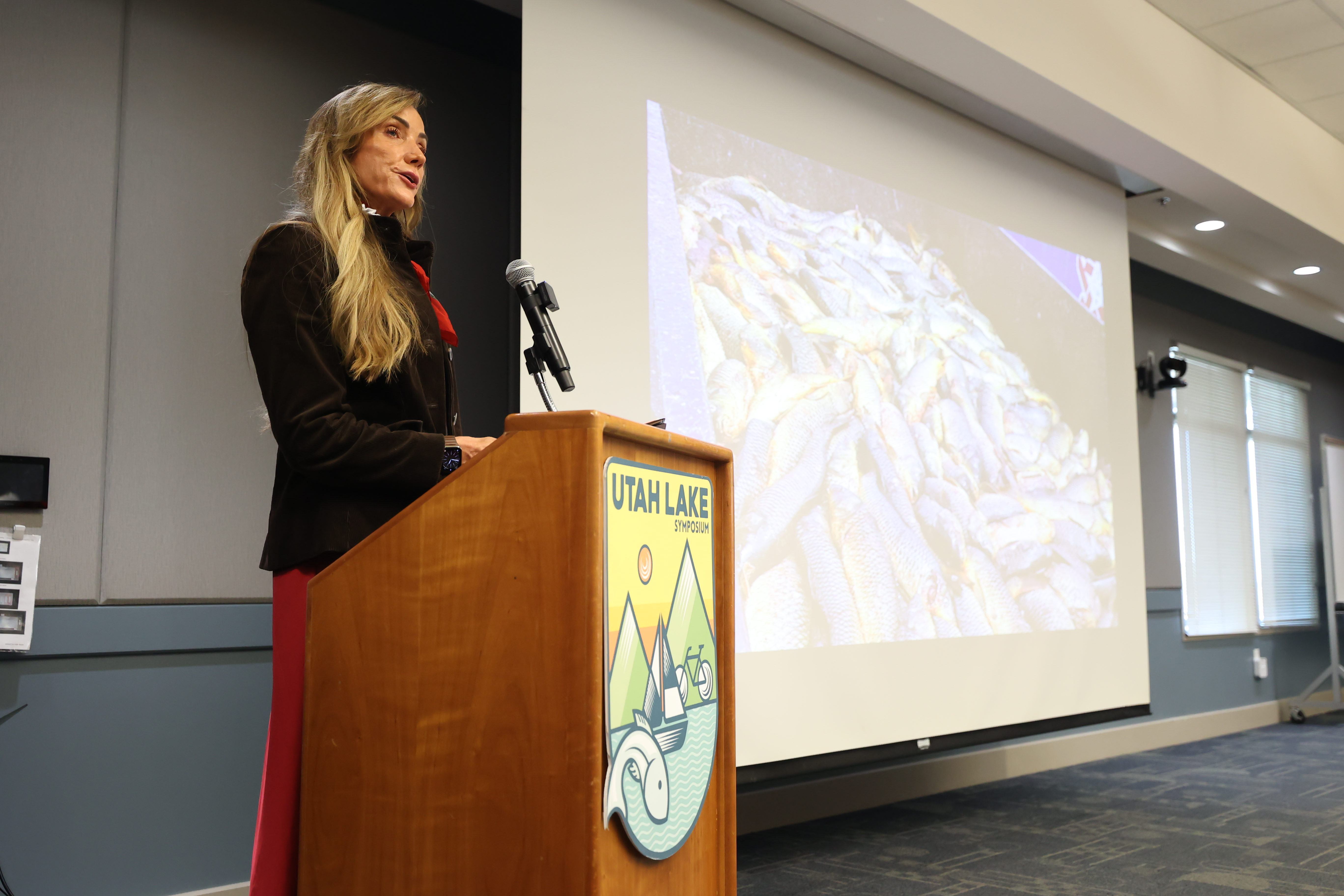Provo Mayor Michelle Kaufusi speaks during the Utah Lake Symposium held at the Utah County Health and Justice Building in Provo on Thursday. Kaufusi and the Utah Lake Authority announced a goal to remove carp and water-stealing invasive vegetation within the next decade.