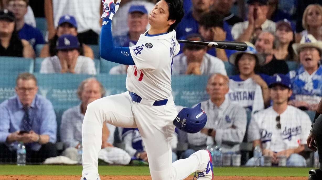 Los Angeles Dodgers' Shohei Ohtani strikes out against the Toronto Blue Jays during the third inning in Game 5 of baseball's World Series, Wednesday, Oct. 29, 2025, in Los Angeles.