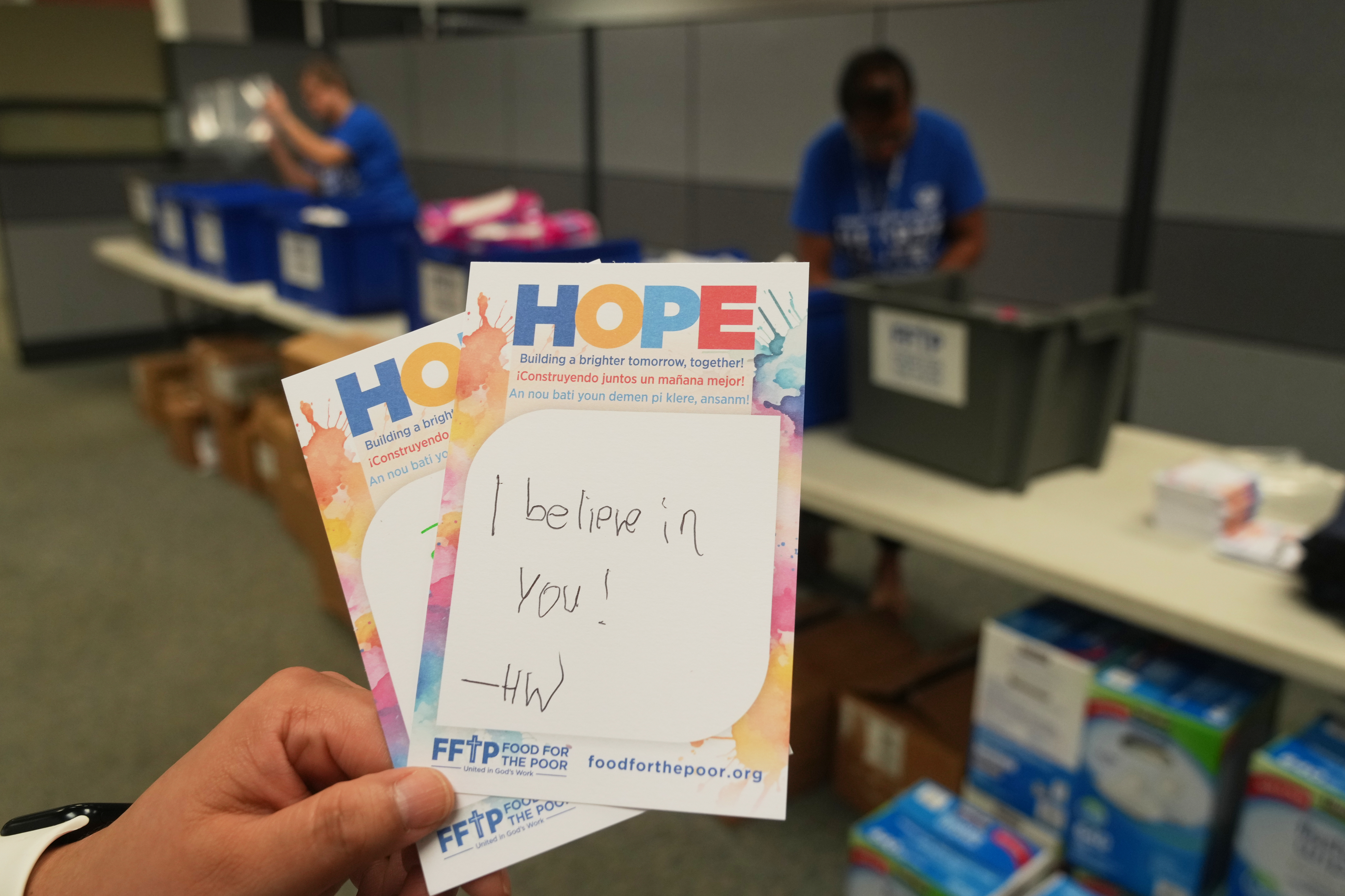 Encouraging notes written by volunteers wait to be placed in feminine hygiene packages bound for Jamaica, Thursday, at Food for the Poor in Coconut Creek, Fla. Rescue and aid workers were fanning out Saturday to reach those communities still isolated after Hurricane Melissa's historic landfall.