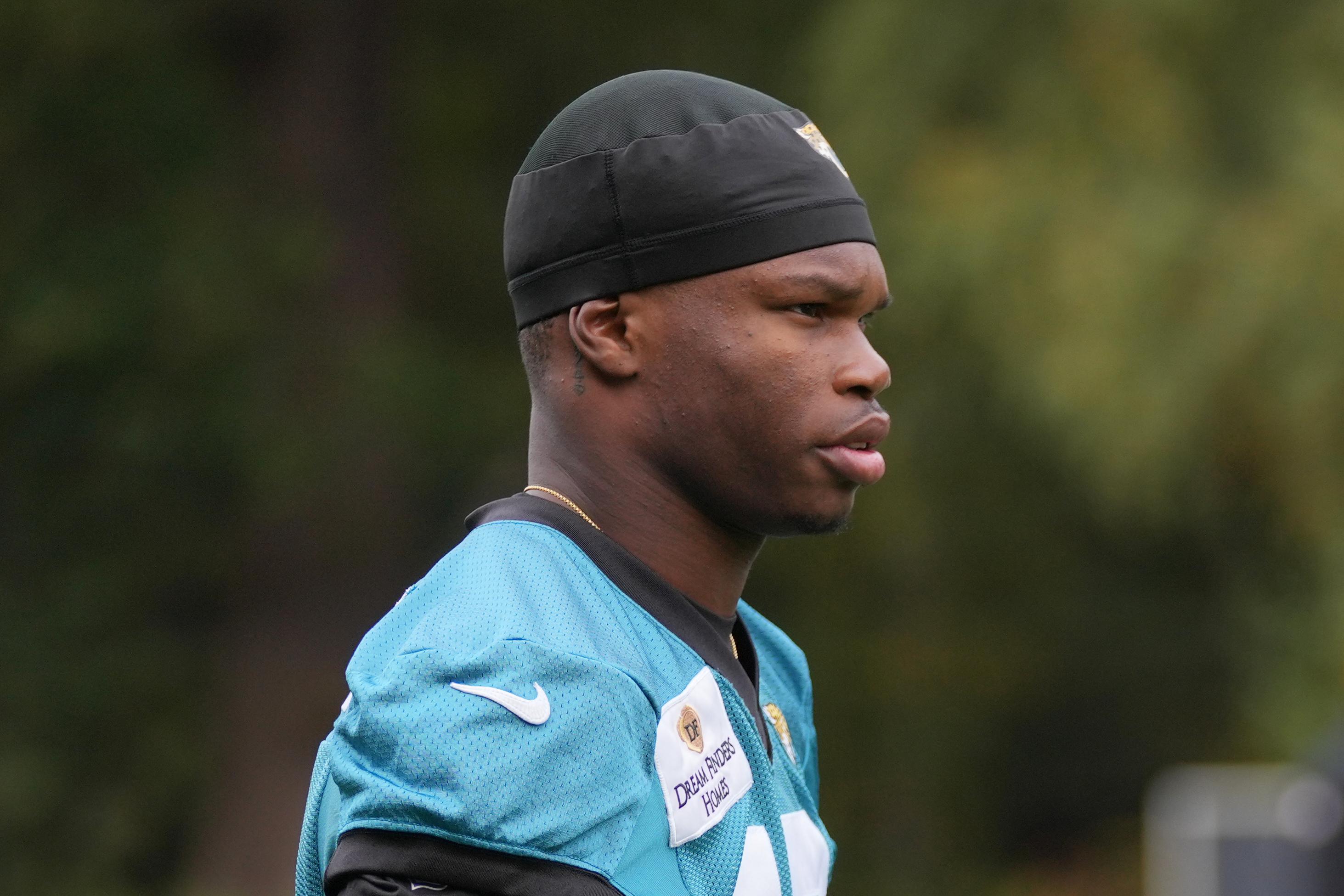 Jacksonville Jaguars wide receiver Travis Hunter (12), attends an NFL football practice at The Grove in Watford, England, Friday, Oct. 17, 2025. 