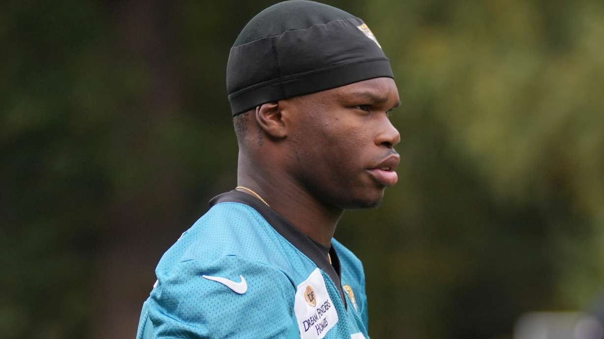Jacksonville Jaguars wide receiver Travis Hunter (12), attends an NFL football practice at The Grove in Watford, England, Friday, Oct. 17, 2025.