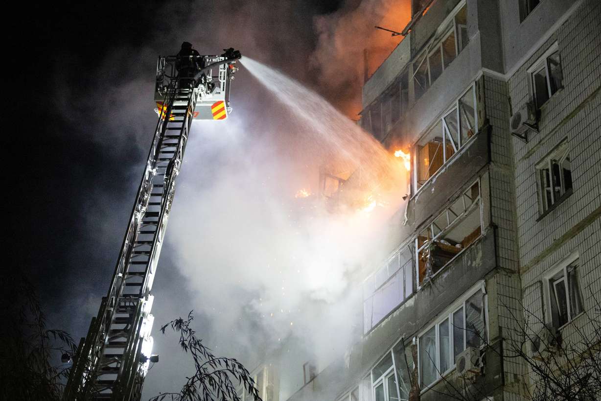 Emergency personnel work to extinguish a fire in Sumy, Ukraine, on Friday. Ukraine is struggling to hold onto Pokrovsk as war rages on in eastern Europe.
