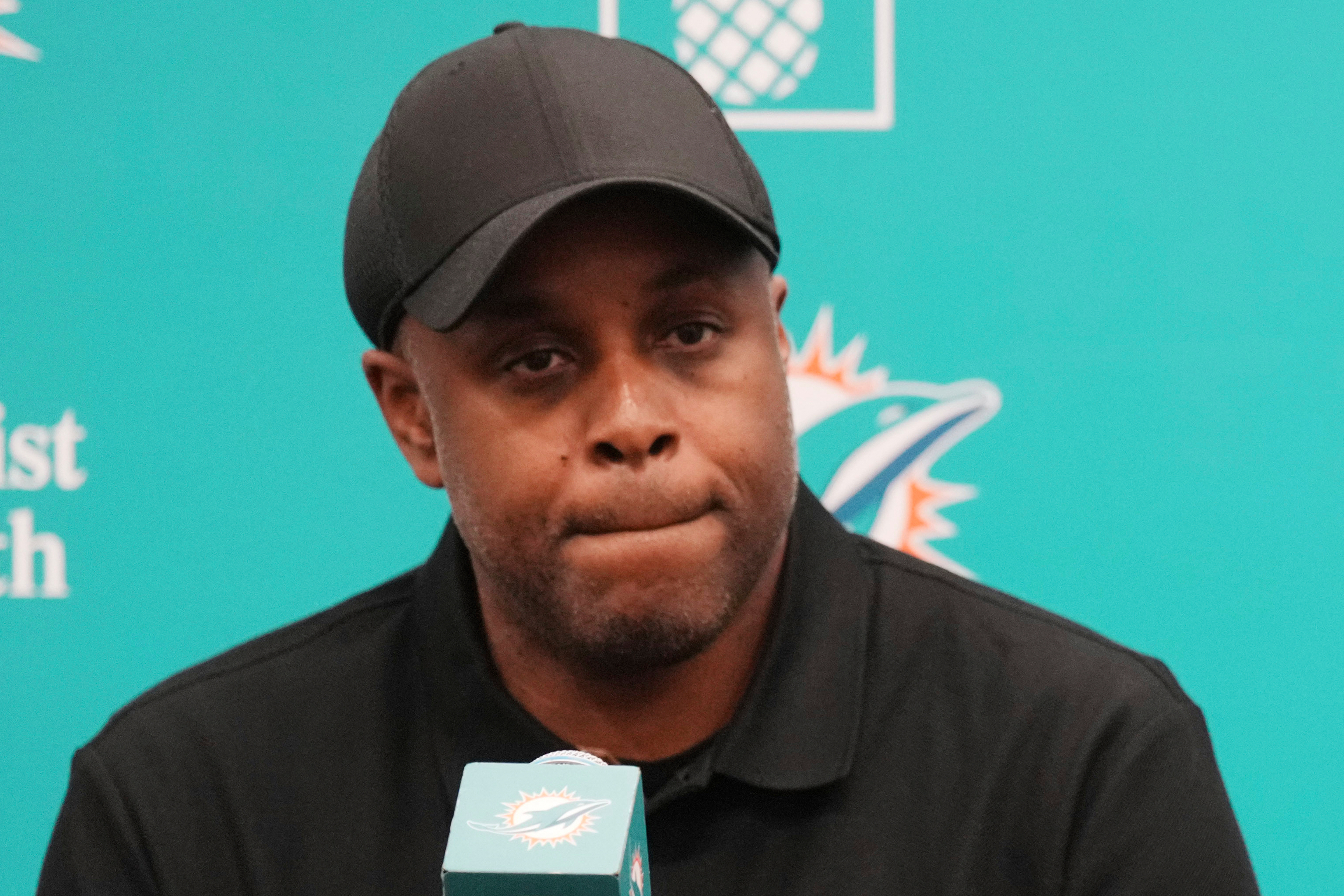 Miami Dolphins general manager Chris Grier listens questions during an NFL football press conference, Friday, April 25, 2025, in Miami Gardens, Fla. 