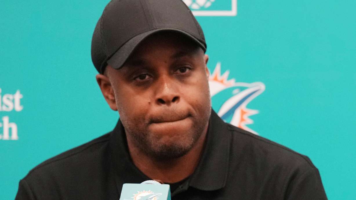 Miami Dolphins general manager Chris Grier listens questions during an NFL football press conference, Friday, April 25, 2025, in Miami Gardens, Fla.