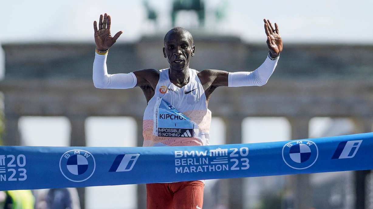 FILE - Kenya's Eliud Kipchoge crosses the line to win the men's division of the Berlin Marathon in Berlin, Germany, Sunday, Sept. 24, 2023. (AP Photo/Markus Schreiber, FILE_