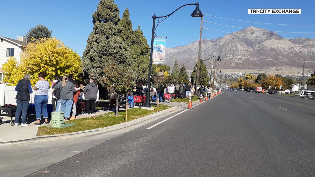 A line runs down Washington Boulevard, outside the Tri-City Exchange in North Ogden on Oct. 24. The exchange is seeking help amid a dramatic increase in demand.
