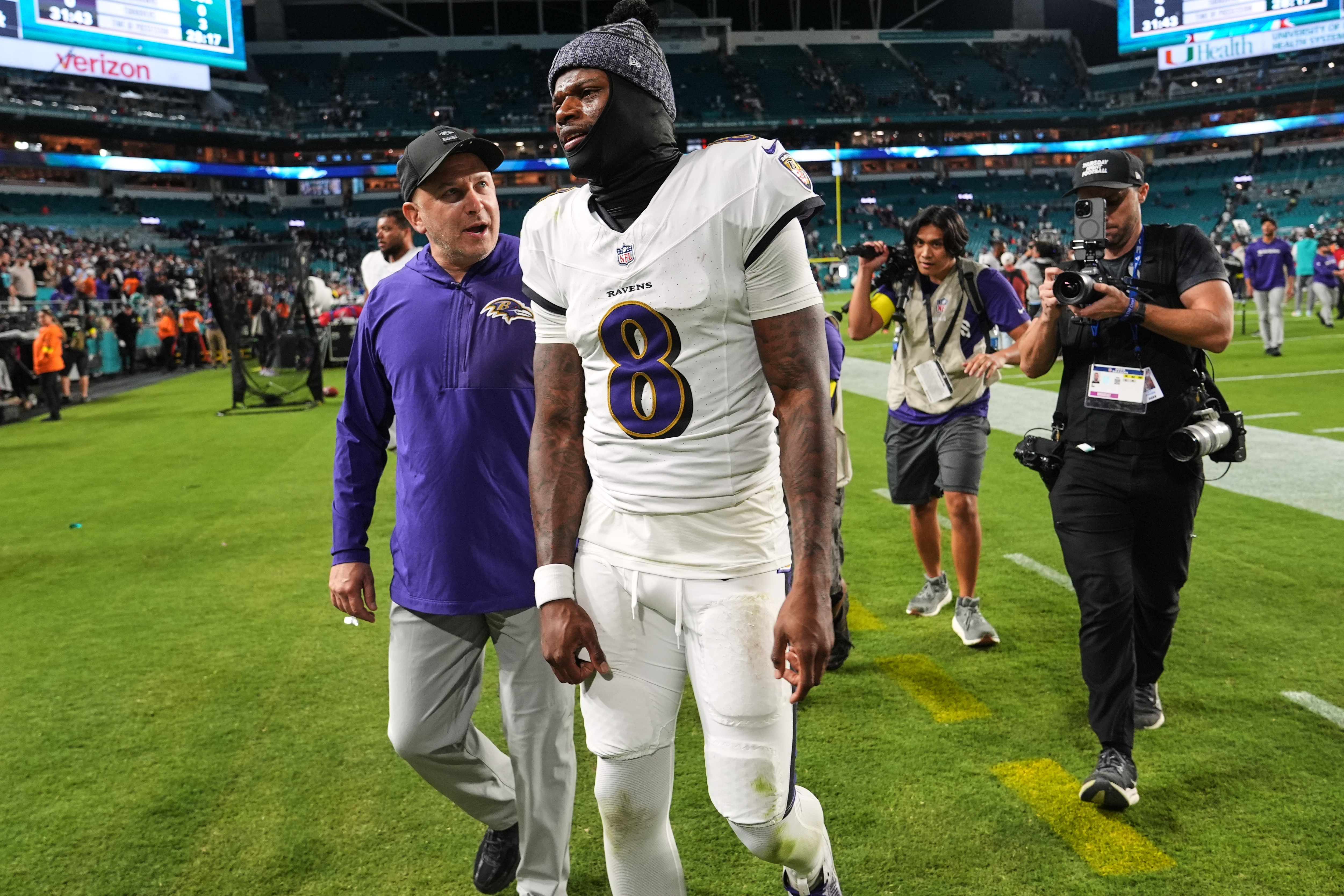Baltimore Ravens quarterback Lamar Jackson (8) leaves the field after a win over the Miami Dolphins in an NFL football game, Thursday, Oct. 30, 2025, in Miami Gardens, Fla. 