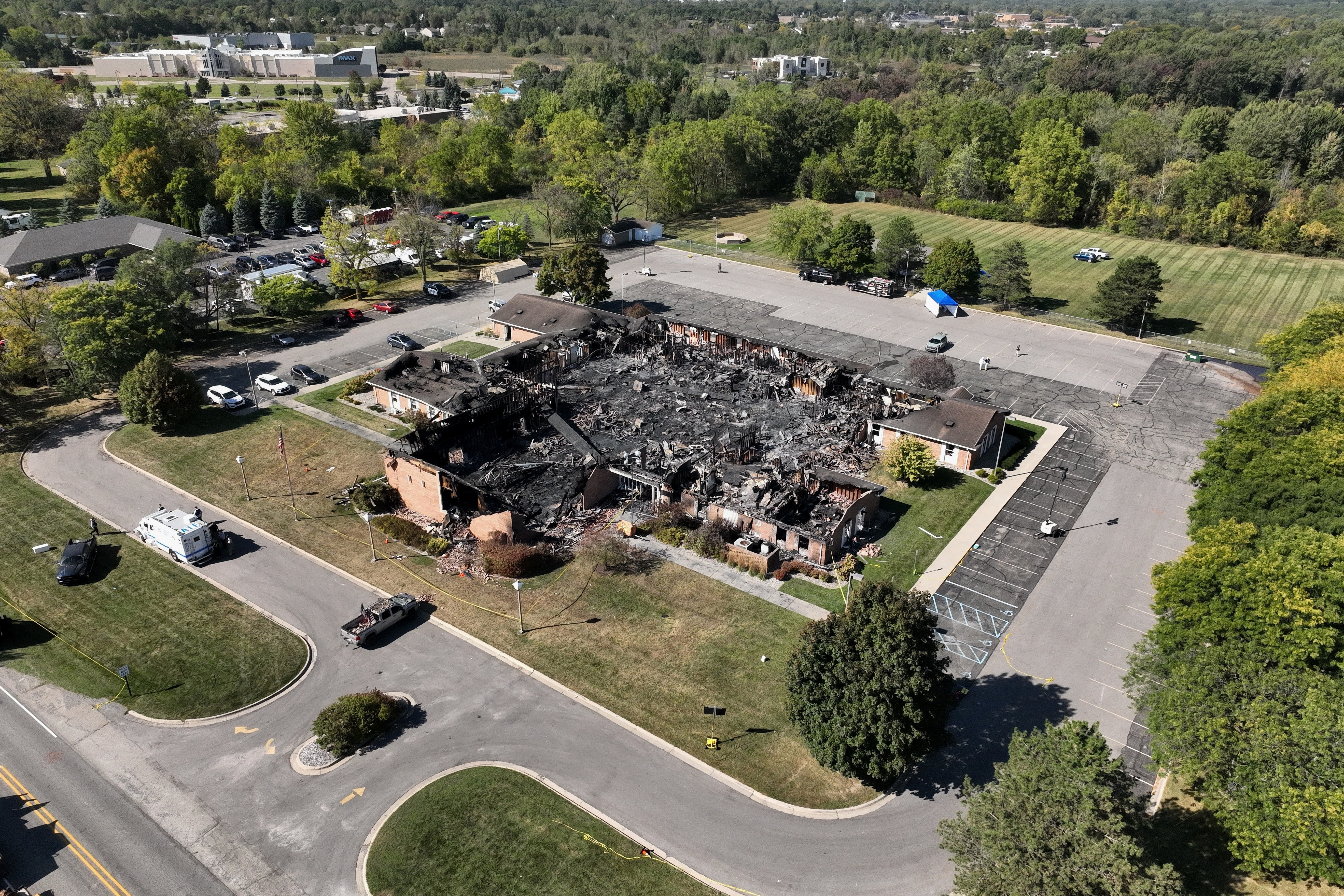 Little remained of The Church of Jesus Christ of Latter-day Saints chapel the day after a former Marine opened fire and set the building ablaze in Grand Blanc Township, Mich., Sept. 29, 2025.