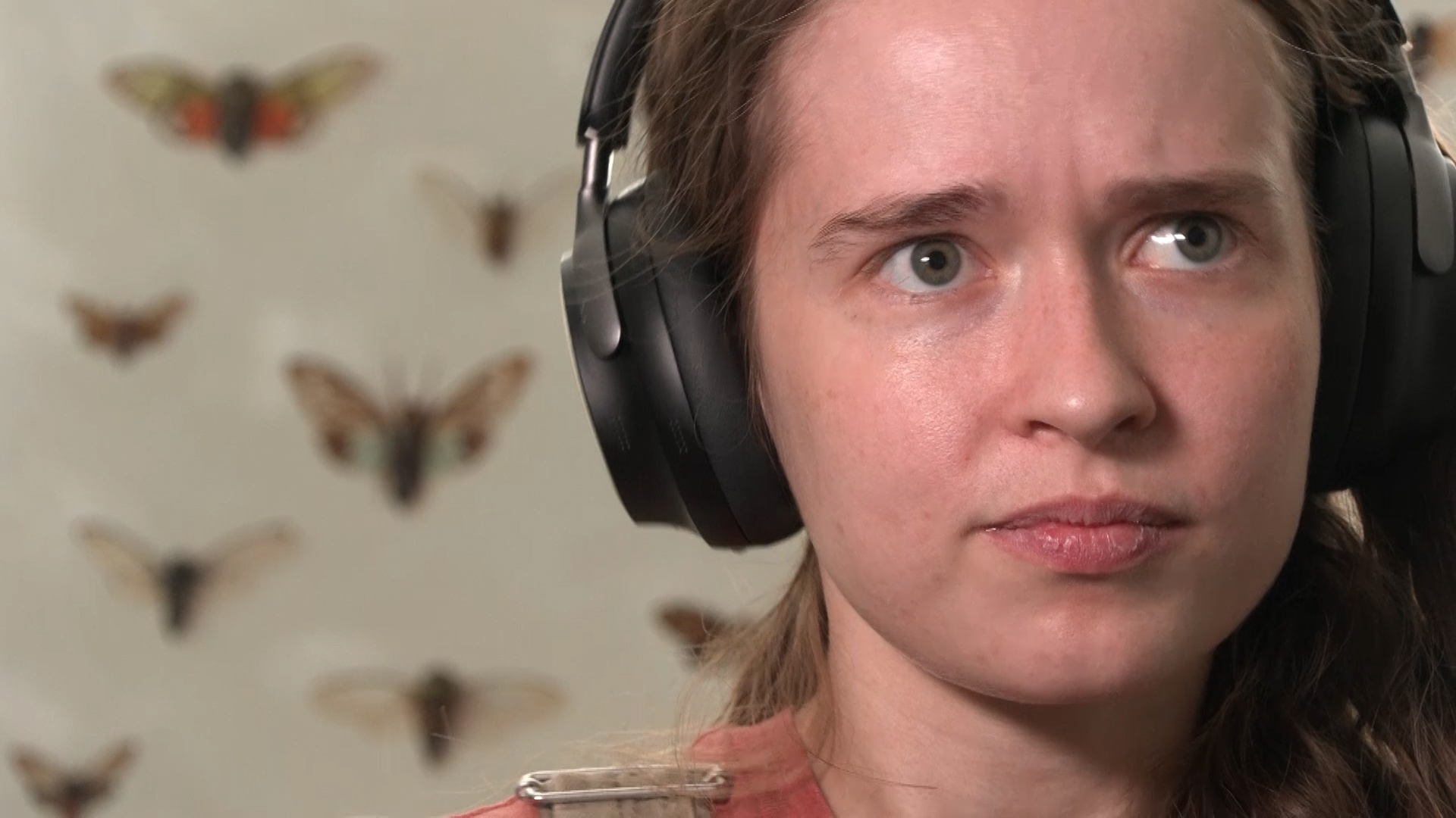 Nicole Parish wears her noise-canceling headphones. Her hypersensitivity to noise can cause meltdowns.