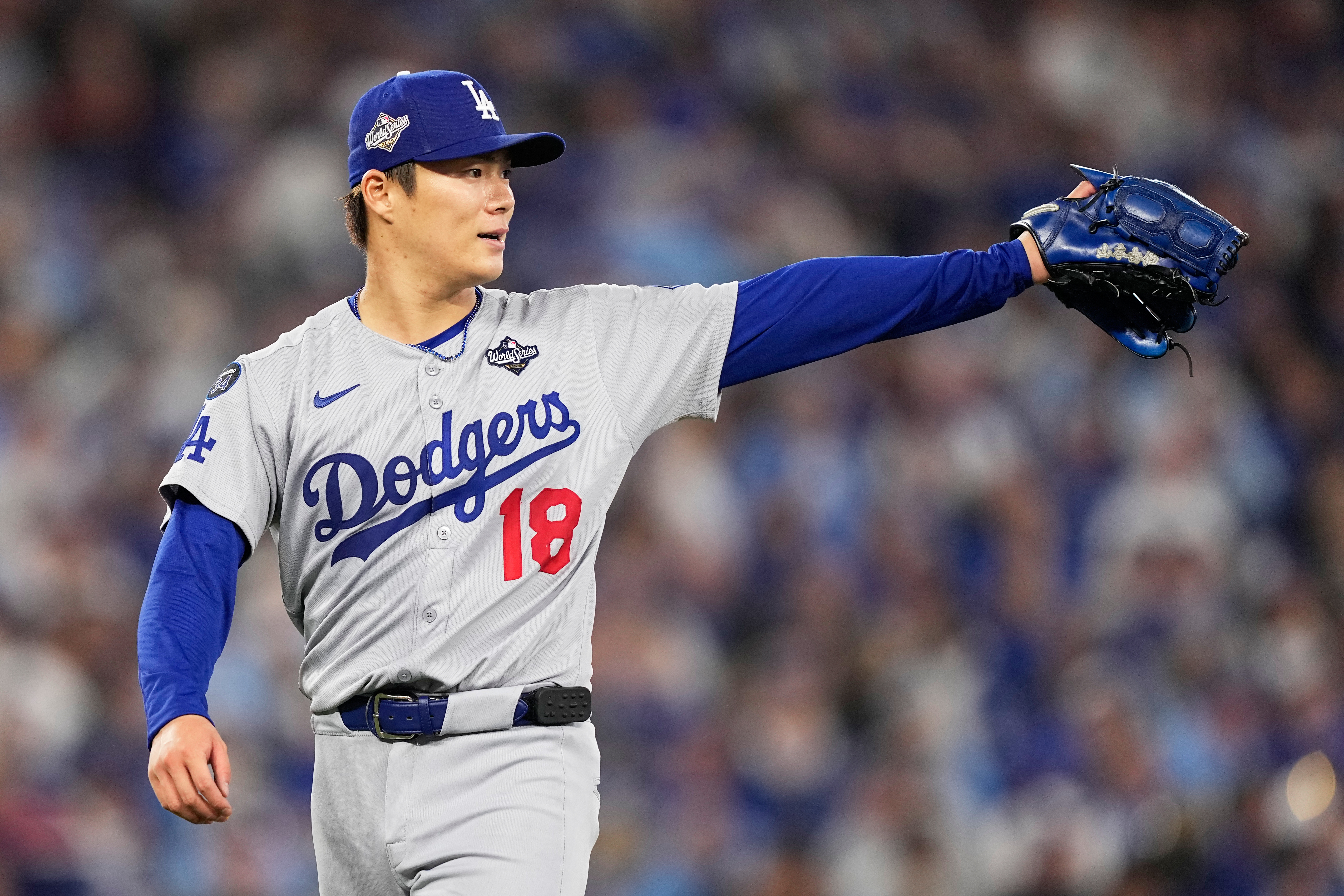 Los Angeles Dodgers pitcher Yoshinobu Yamamoto gestures during the fourth inning in Game 6 of baseball's World Series against the Toronto Blue Jays, Friday, Oct. 31, 2025, in Toronto. 