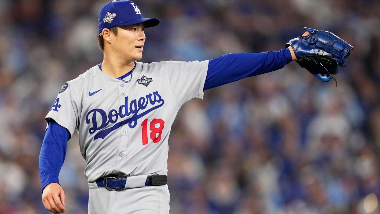Los Angeles Dodgers pitcher Yoshinobu Yamamoto gestures during the fourth inning in Game 6 of baseball's World Series against the Toronto Blue Jays, Friday, Oct. 31, 2025, in Toronto.