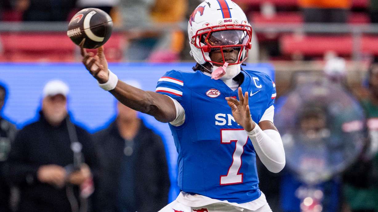 SMU quarterback Kevin Jennings throws a pass during the first half of an NCAA college football game against Miami, Saturday, Nov. 1, 2025, in Dallas.