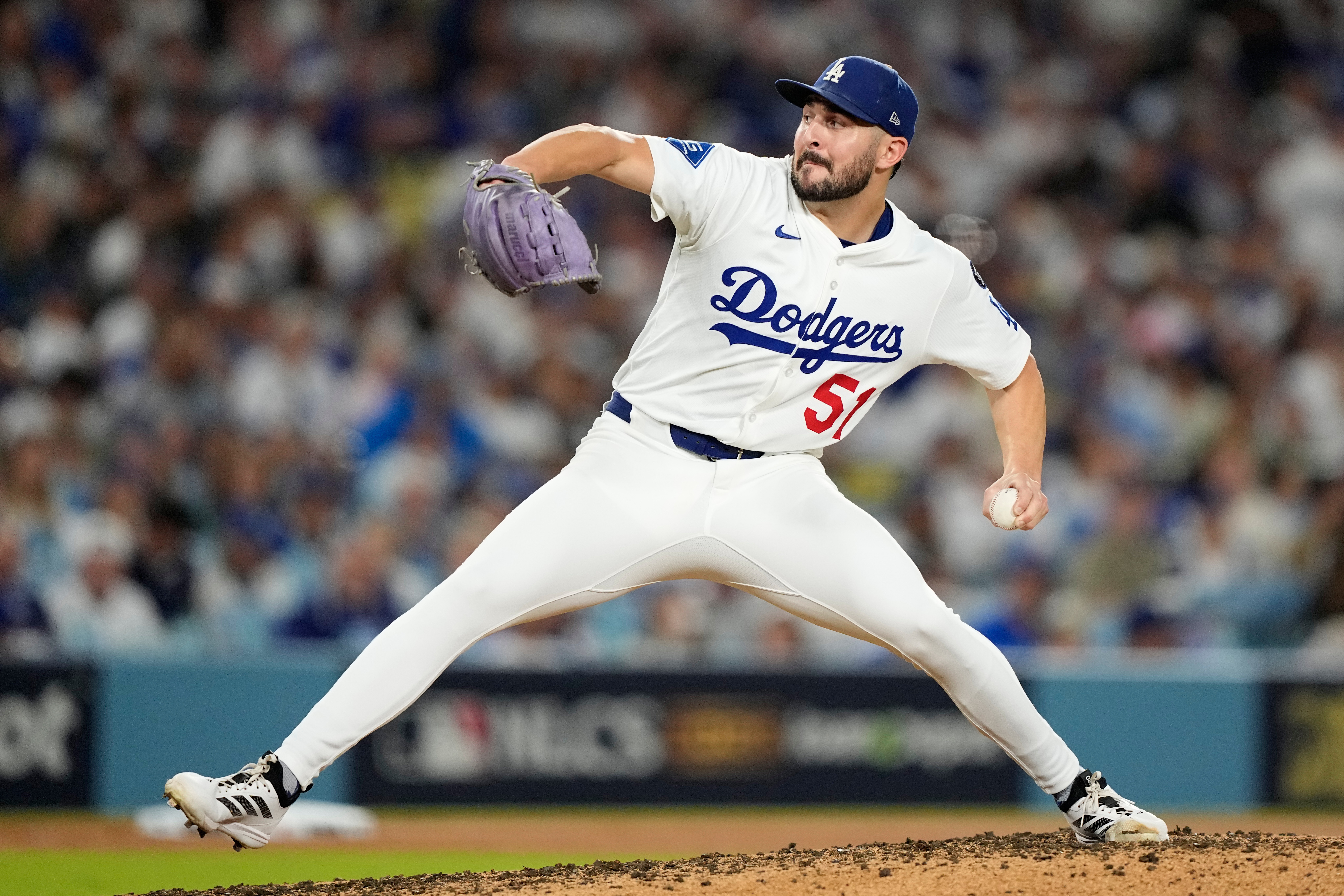 Los Angeles Dodgers pitcher Alex Vesia throws against the Milwaukee Brewers during the seventh inning in Game 4 of baseball's National League Championship Series, Friday, Oct. 17, 2025, in Los Angeles. 