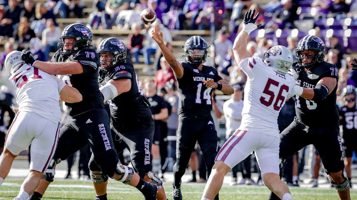 Weber State quarterback Kingston Tisdell makes a throw against Montana.