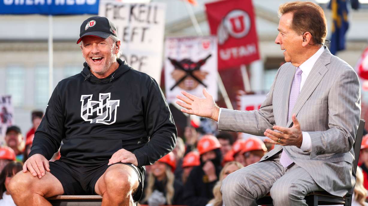 Utah Football Head Coach Kyle Whittingham, left, and “College GameDay” analyst Nick Saban, right, talk during ESPN’s “College GameDay” in the President's Circle at the University of Utah in Salt Lake City on Saturday, Nov. 1, 2025.