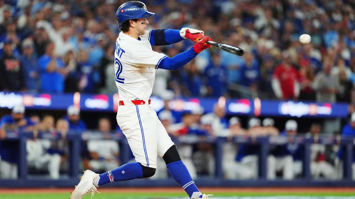 Toronto Blue Jays' Ernie Clement hits a double against the Los Angeles Dodgers during the eighth inning in Game 7 of baseball's World Series in Toronto on Saturday, Nov. 1, 2025.