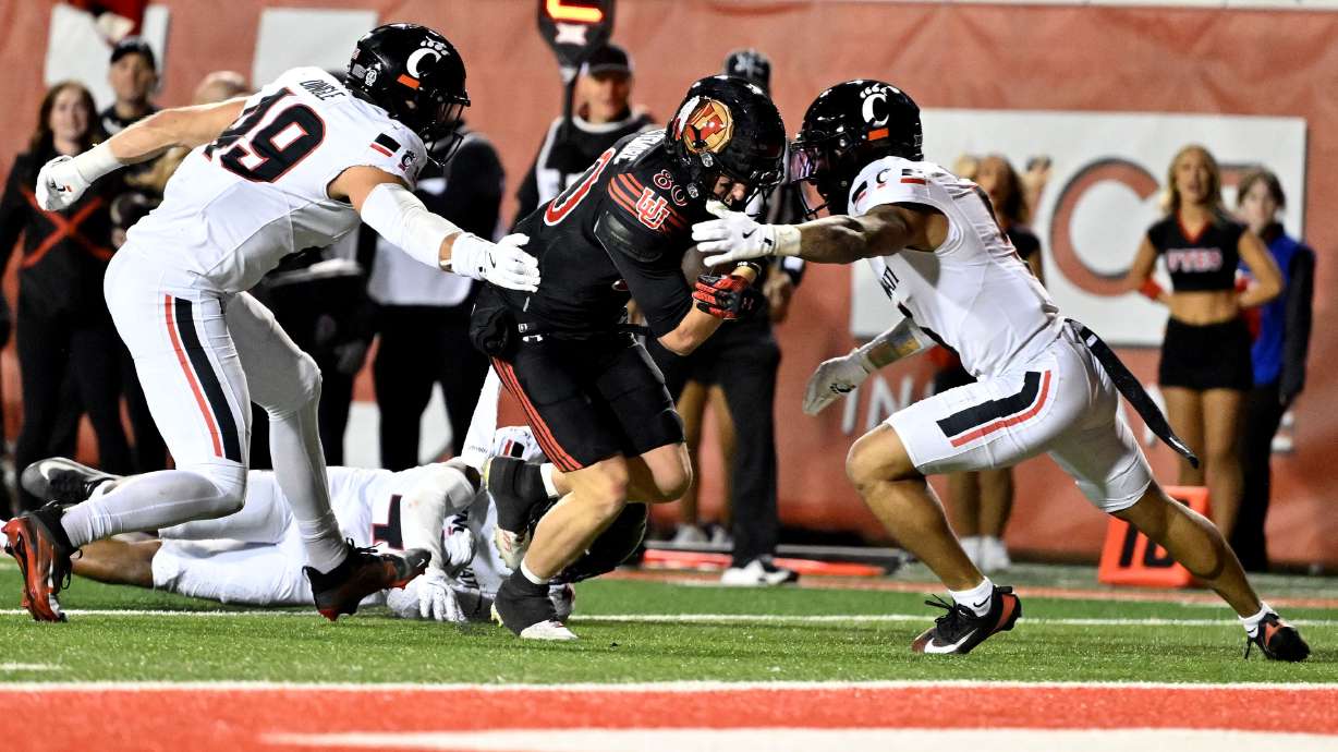 Utah Utes wide receiver Creed Whittemore (80) powers his way into the endzome as Utah and Cincinnati play at Rice Eccles Stadium in Salt Lake City on Saturday, Nov. 1, 2025.