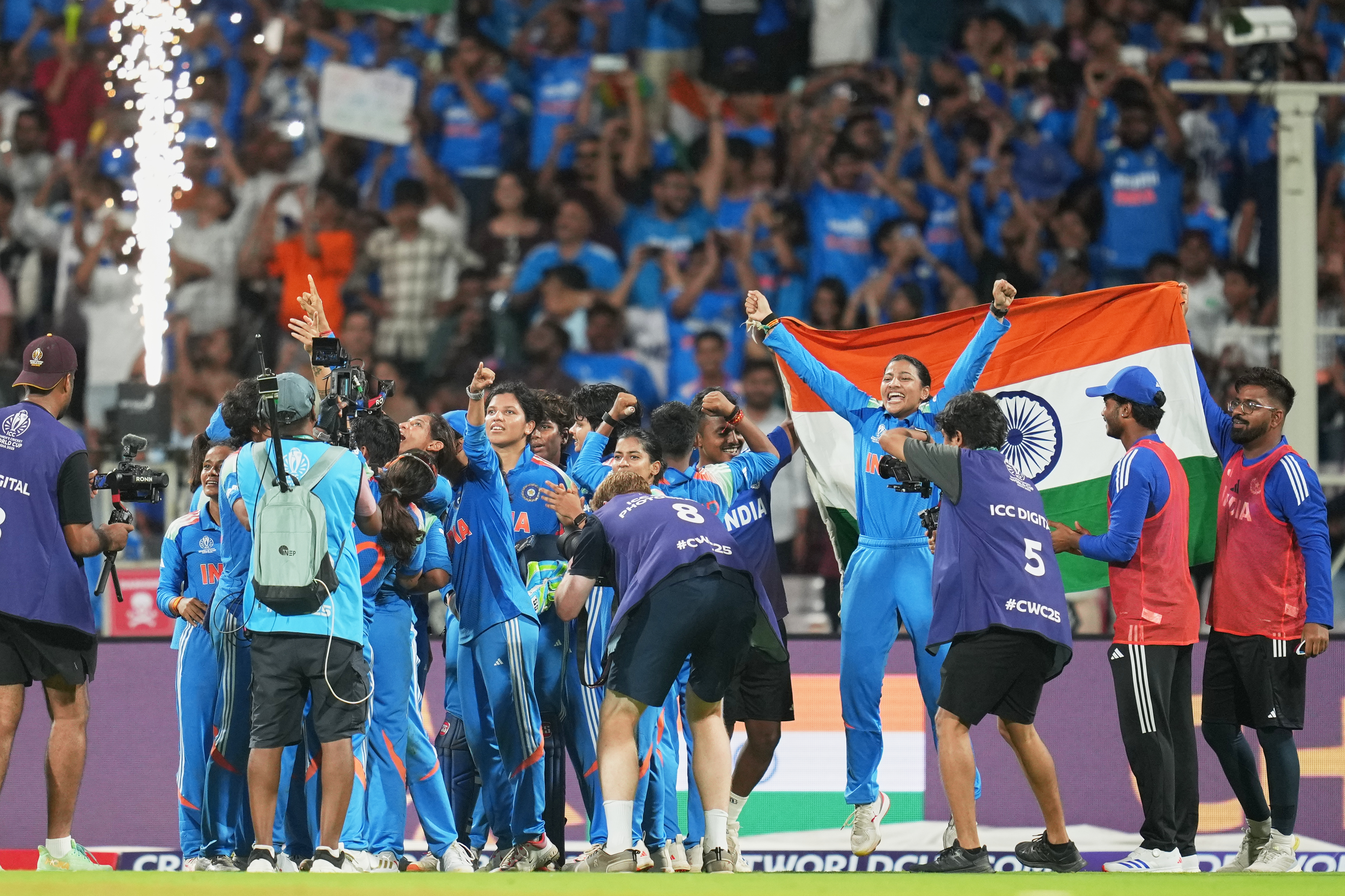 India's players celebrate after winning the ICC Women's Cricket World Cup final match between India and South Africa in Navi Mumbai, India, Sunday, Nov. 2, 2025. 