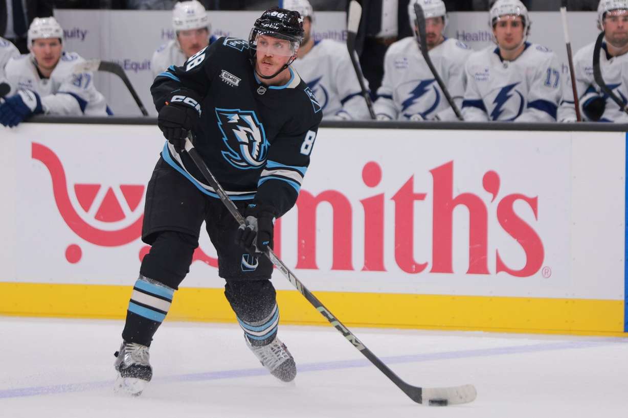 Utah Mammoth defenseman Nate Schmidt (88) passes the puck during the third period of an NHL game against the Tampa Bay Lightning at the Delta Center in Salt Lake City on Sunday, Nov. 2, 2025.