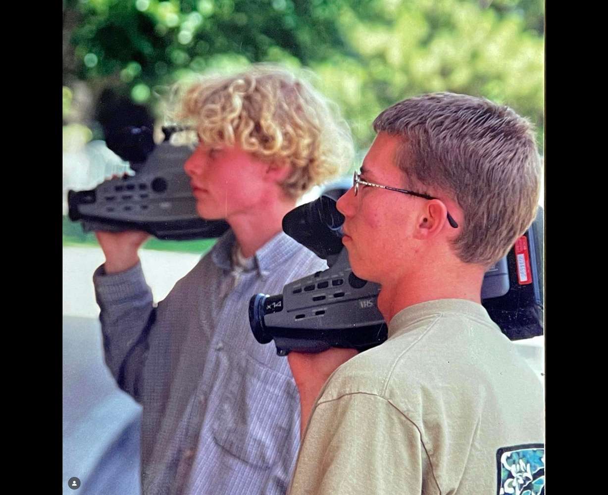 The Lewis brothers are pictured during their high school years with video cameras in this family photo. From an Amazon spot to the "Disagree Better" campaign, the northern Utah brothers have built their film company over the course of decades.
