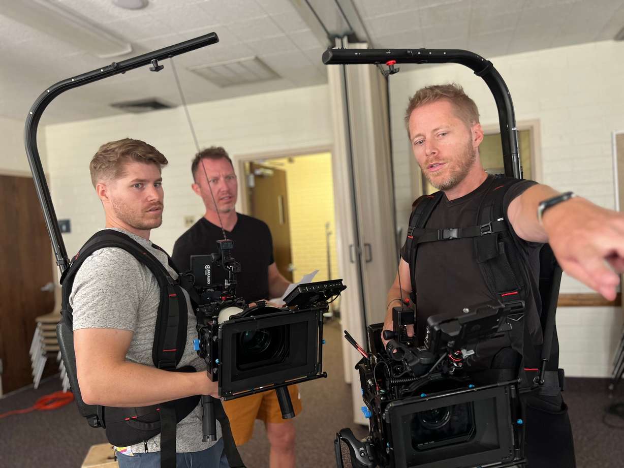 While filming a spot for Boncom, Taylor Lewis, left, Rhett Lewis, middle and Burke Lewis plan the next shot. From an Amazon spot to the "Disagree Better" campaign, the northern Utah brothers have built their film company over the course of decades.