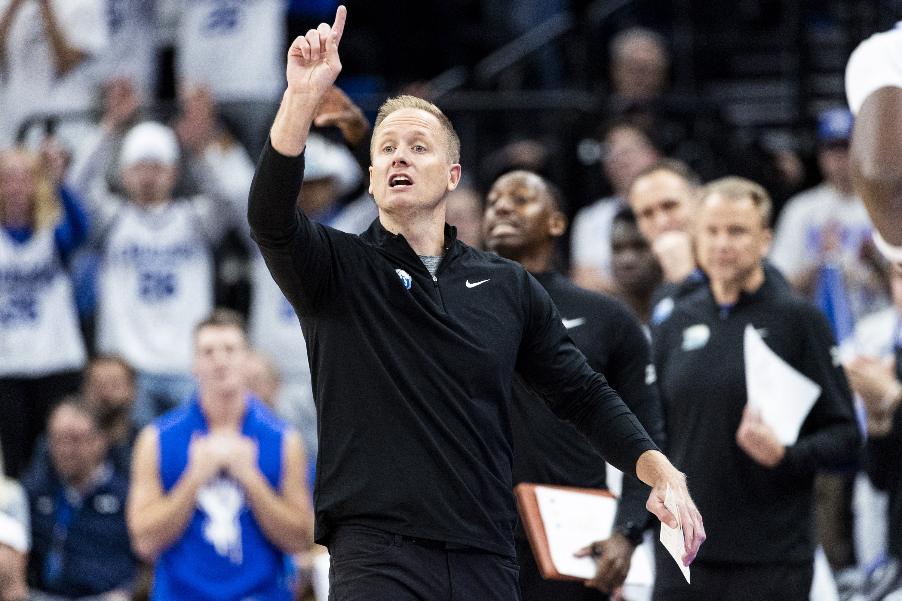BYU head coach Kevin Young calls out to his players during an NCAA men’s basketball exhibition game against North Carolina held at the Delta Center in Salt Lake City on Friday, Oct. 24, 2025.