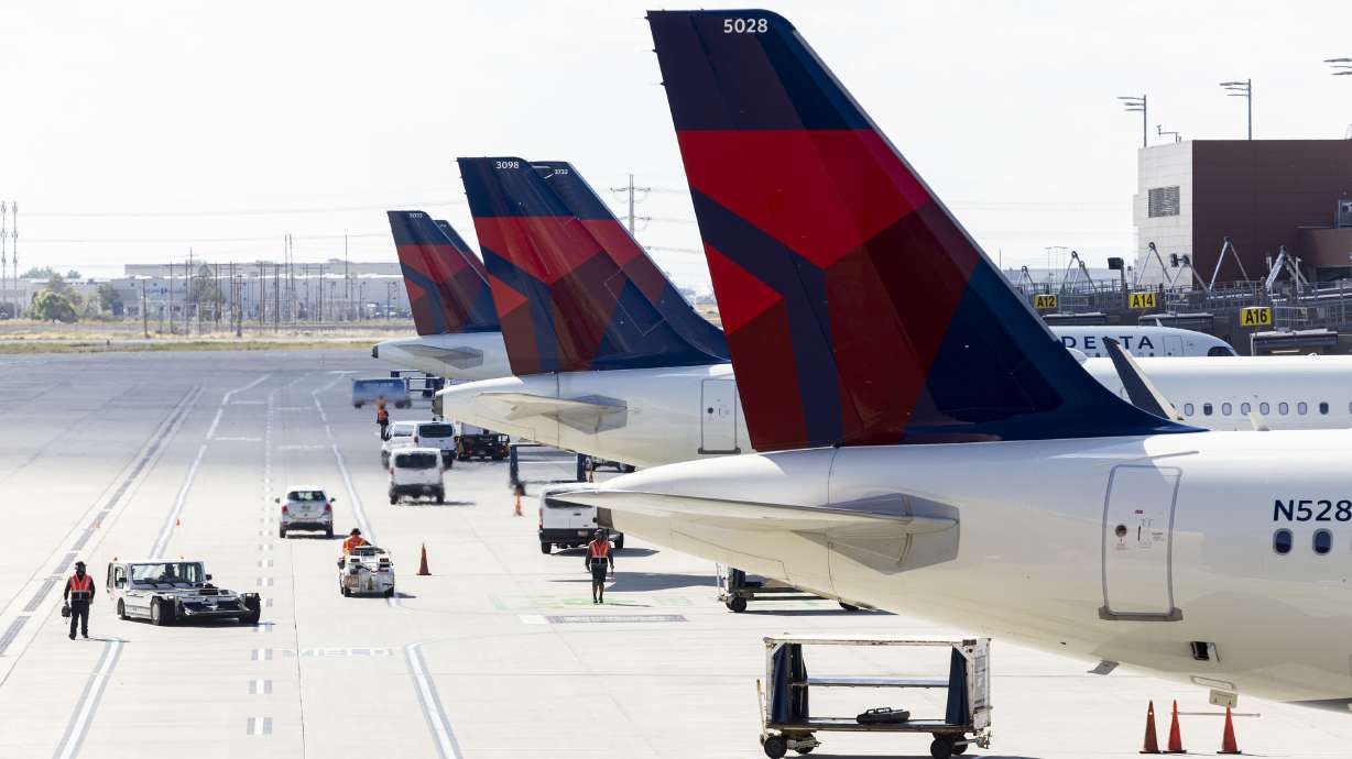 Delta planes at the Salt Lake City International Airport in Salt Lake City on Sept. 12, 2024. Nearly two dozen passengers who were on a flight from Salt Lake City to Amsterdam are suing the airline over severe turbulence.