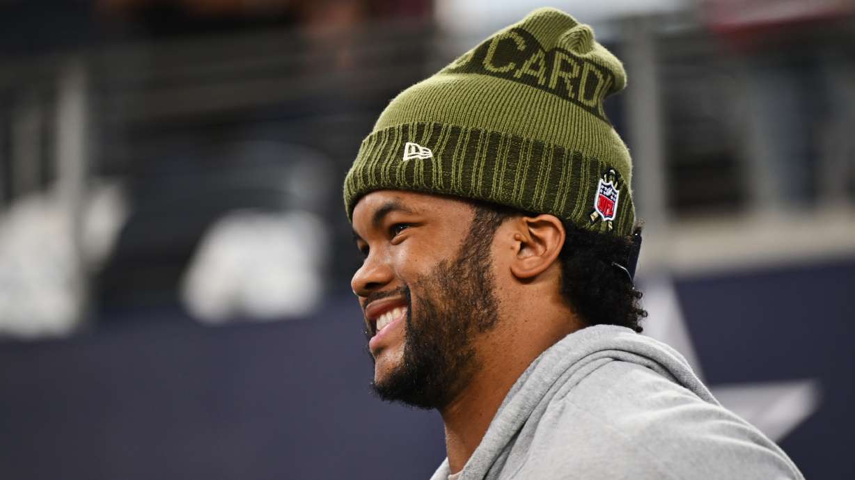 Arizona Cardinals quarterback Kyler Murray works out on the sideline before an NFL football game against the Dallas Cowboys, Monday, Nov. 3, 2025, in Arlington, Texas.